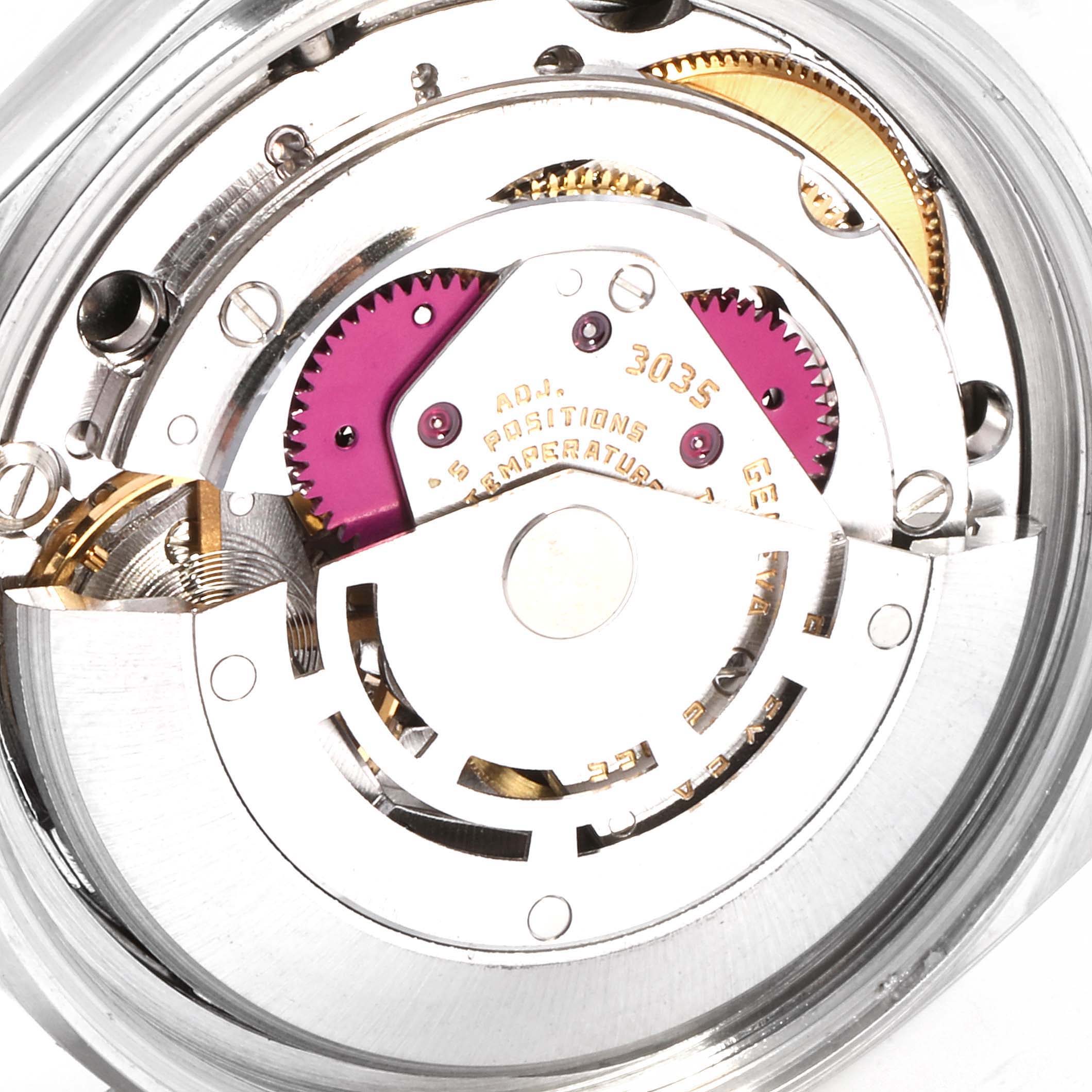 This is an up-close view of the internal mechanism of a Rolex Datejust 16014 Men
s Stainless Steel Silver Dial 16014 Men
s Stainless Steel Silver Dial watch, displaying gears and intricate parts.