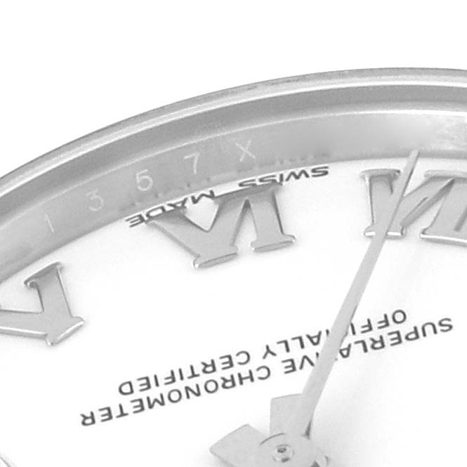 The image shows a close-up of the Mid-Size Rolex watch dial, highlighting the Roman numerals and the text "SWISS MADE."