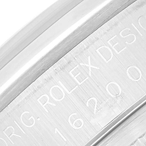 This close-up image shows the engraved details on the inner bezel of a Rolex Datejust 16200 Men's Stainless Steel Silver Dial 16200 Men's Stainless Steel Silver Dial watch.
