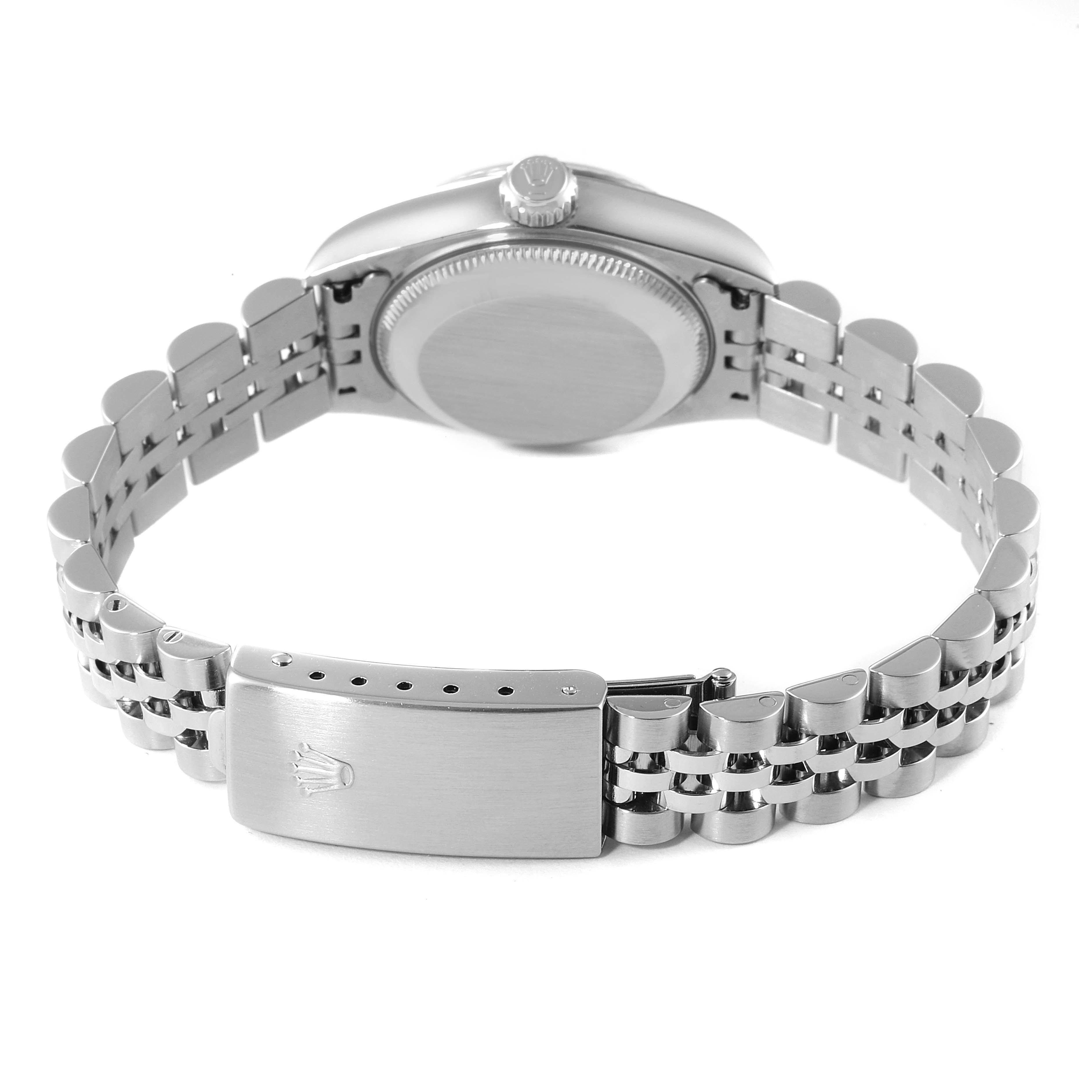 The image shows the back view of a Rolex Datejust 79174 Women's Stainless Steel Black Dial 79174 Women's Stainless Steel Black Dial watch, focusing on its case back and Jubilee bracelet with clasp.