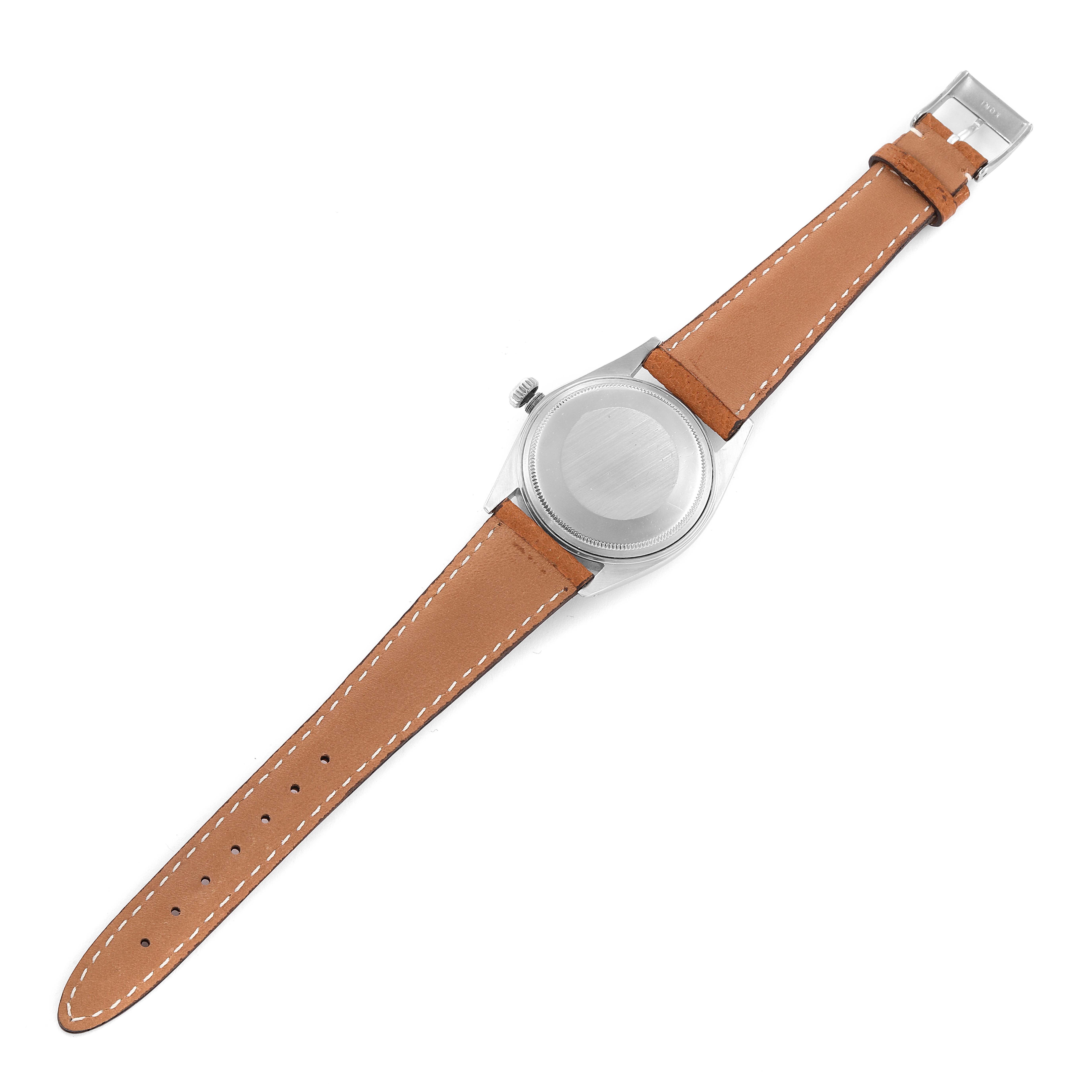 This Rolex Vintage Collection 1601 Men
s Stainless Steel Silver Dial 1601 Men
s Stainless Steel Silver Dial model watch is shown from the back, displaying the case back, crown, and brown leather strap.