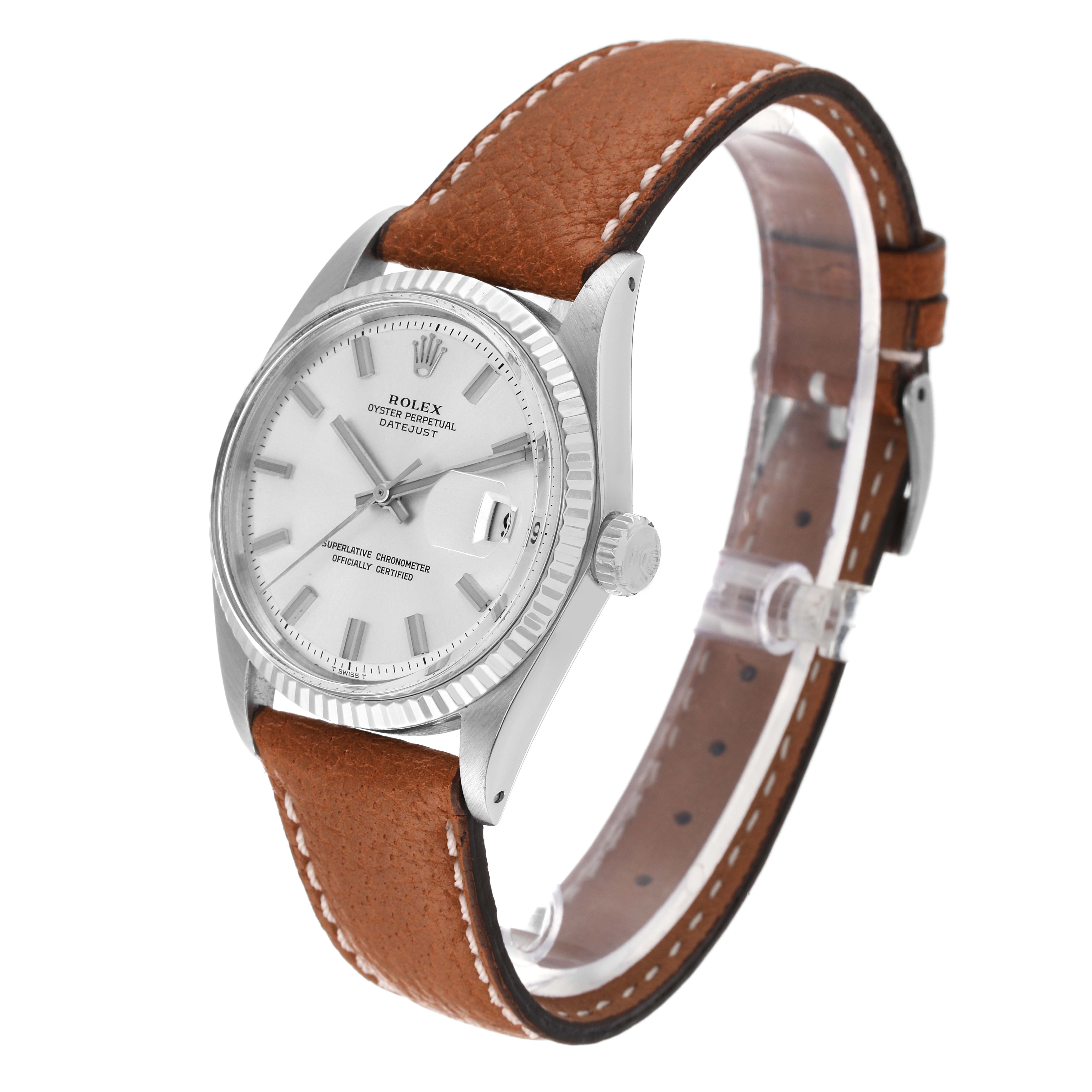 The image shows a side-view angle of the Rolex Vintage Collection 1601 Men
s Stainless Steel Silver Dial 1601 Men
s Stainless Steel Silver Dial watch, highlighting the dial, bezel, crown, and brown leather strap.