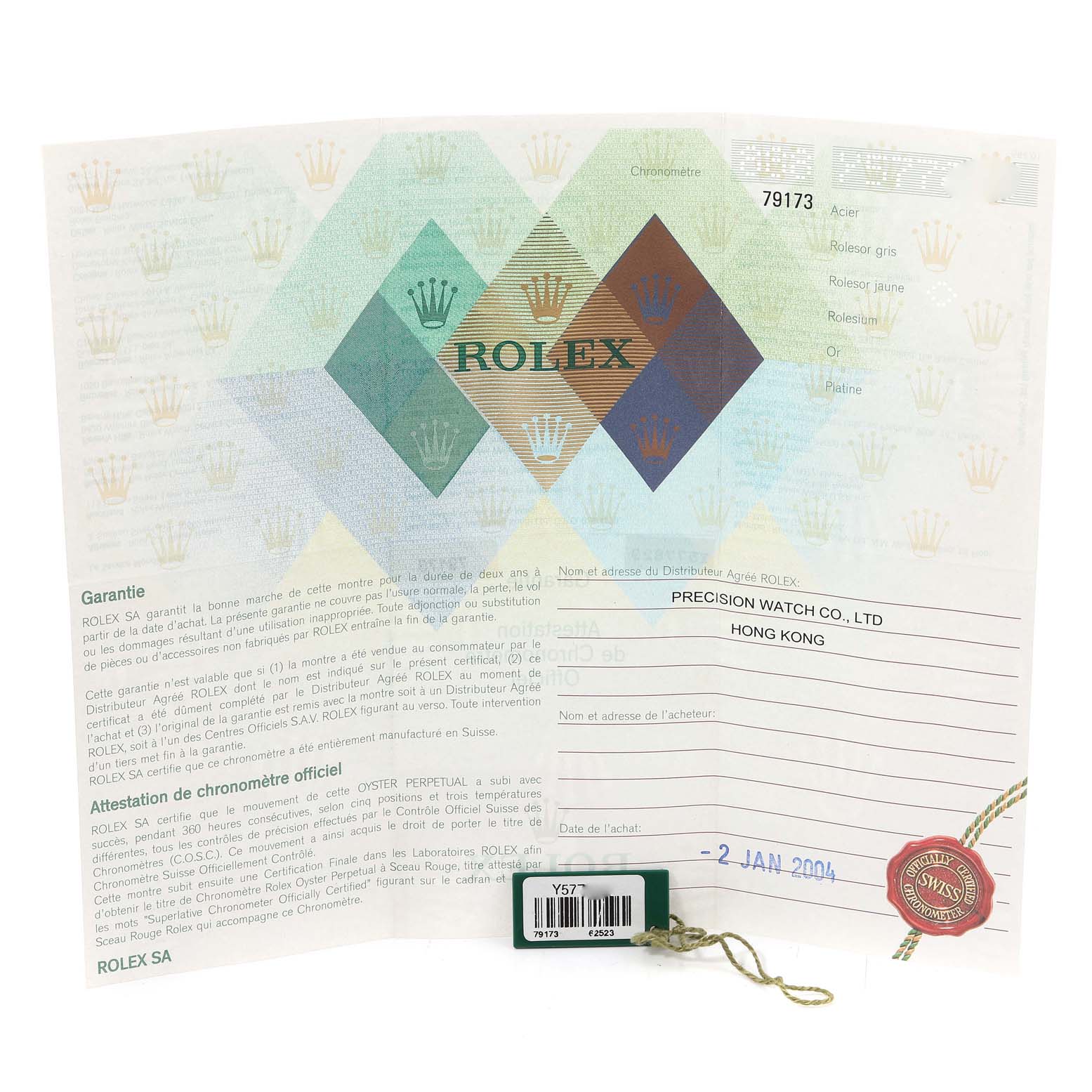 This image shows the warranty and certification papers for a Rolex Datejust 79173 Women's Steel and Gold (two tone) Champagne Dial 79173 Women's Steel and Gold (two tone) Champagne Dial watch, along with a green and white tag attached.