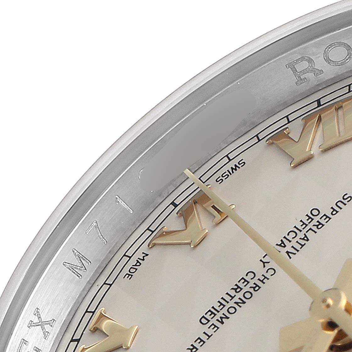 The image shows a close-up of the dial, bezel, and Roman numeral markers of a Rolex Datejust 116233 Men
s Steel and Gold (two tone) Beige Dial 116233 Men
s Steel and Gold (two tone) Beige Dial watch.