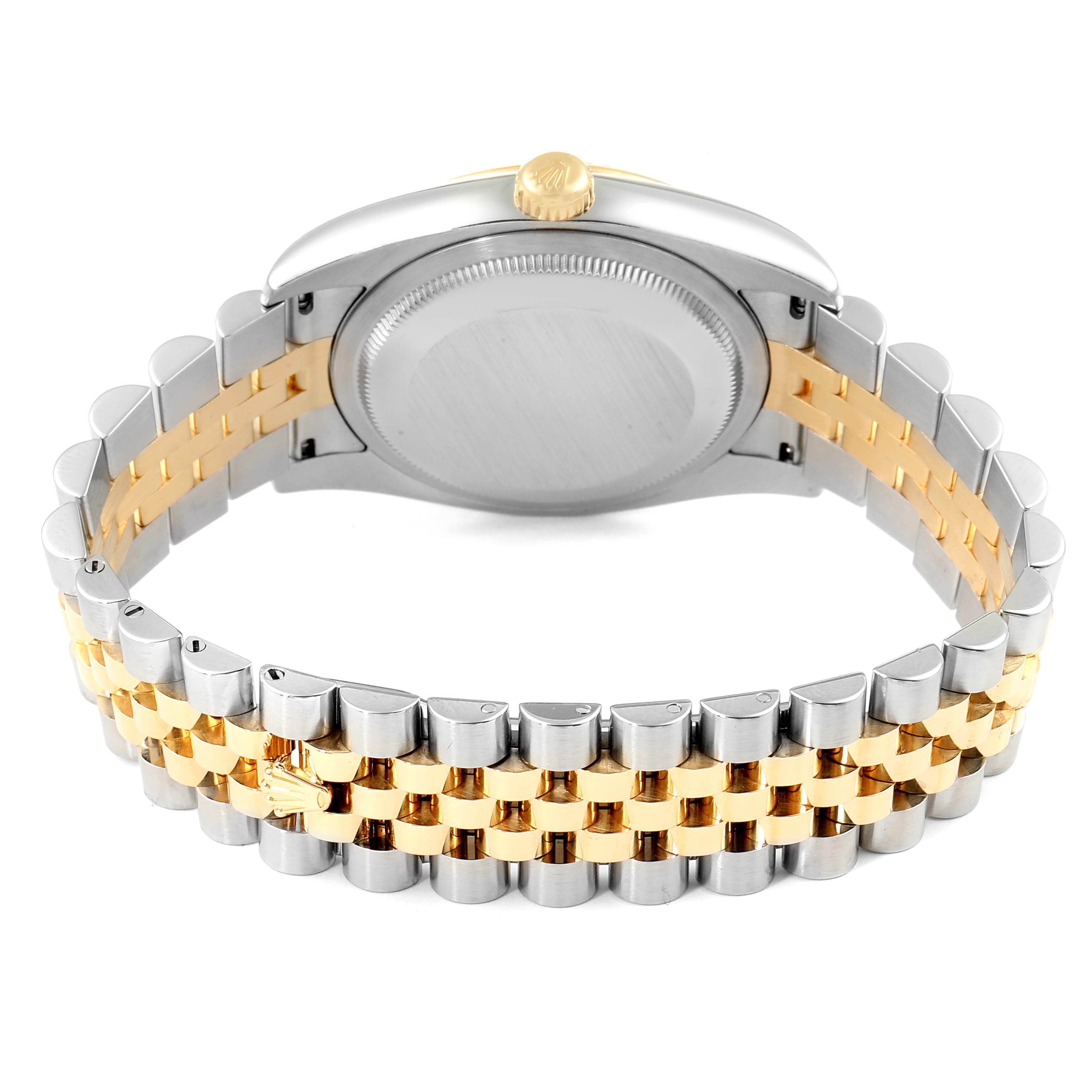 The image shows the back case and two-tone bracelet of a Rolex Datejust 116233 Men
s Steel and Gold (two tone) Beige Dial 116233 Men
s Steel and Gold (two tone) Beige Dial watch from a rear angle.