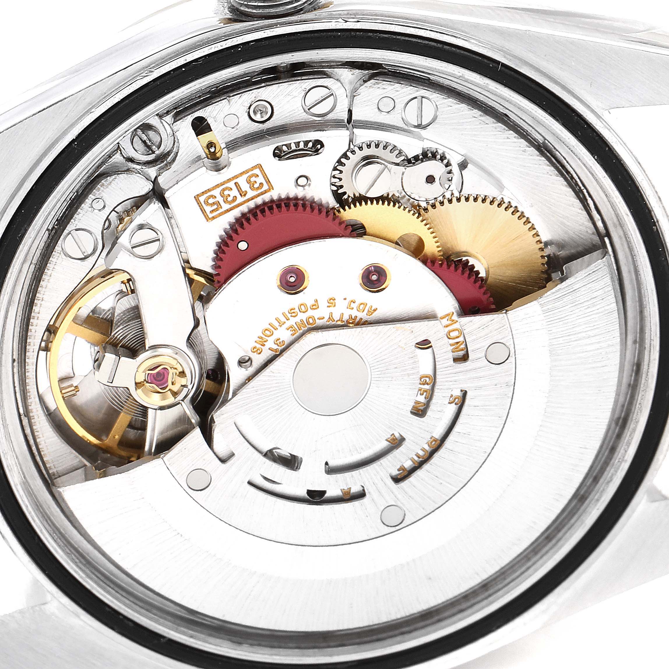 The image shows the internal mechanism of a Rolex Datejust 16233 Men's Steel and Gold (two tone) Grey Dial 16233 Men's Steel and Gold (two tone) Grey Dial watch, focusing on the movement and gears.
