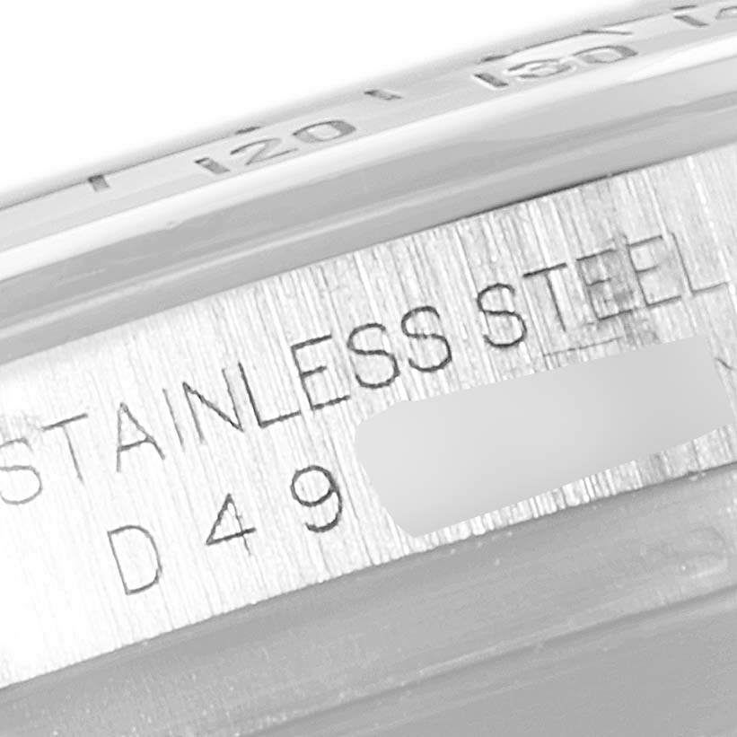 This image features a close-up of the engravings on the stainless steel casing of a Rolex Daytona 116520 Men's Stainless Steel Black Dial 116520 Men's Stainless Steel Black Dial watch.