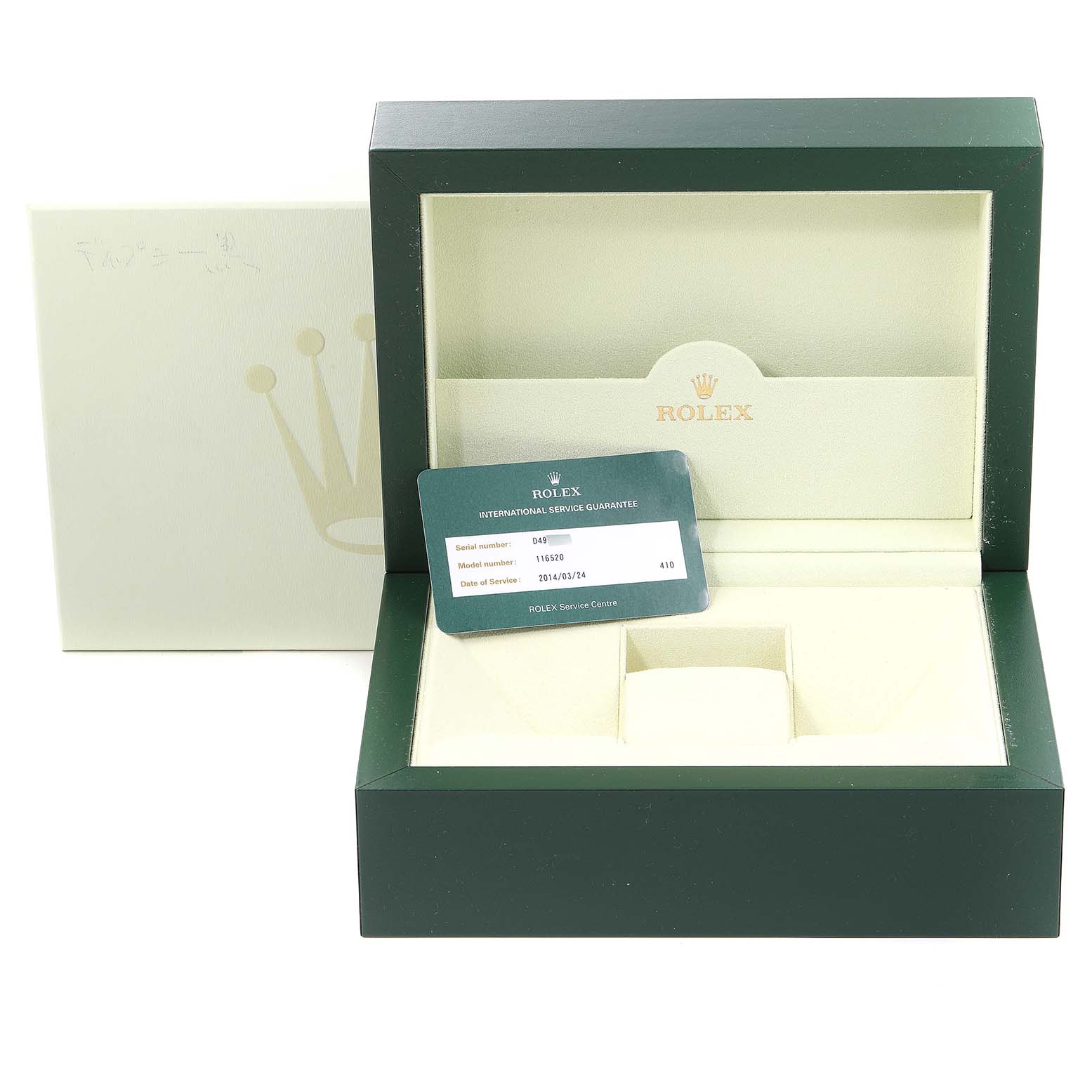 This image shows the open box and the international service guarantee card for a Rolex Daytona 116520 Men's Stainless Steel Black Dial 116520 Men's Stainless Steel Black Dial watch.