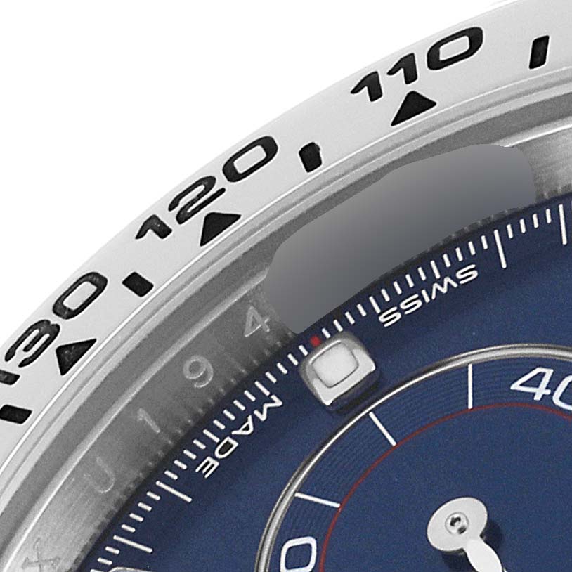 This image shows a close-up of the bezel and dial of a Rolex Daytona 116509 Men's White Gold Blue Dial 116509 Men's White Gold Blue Dial watch.