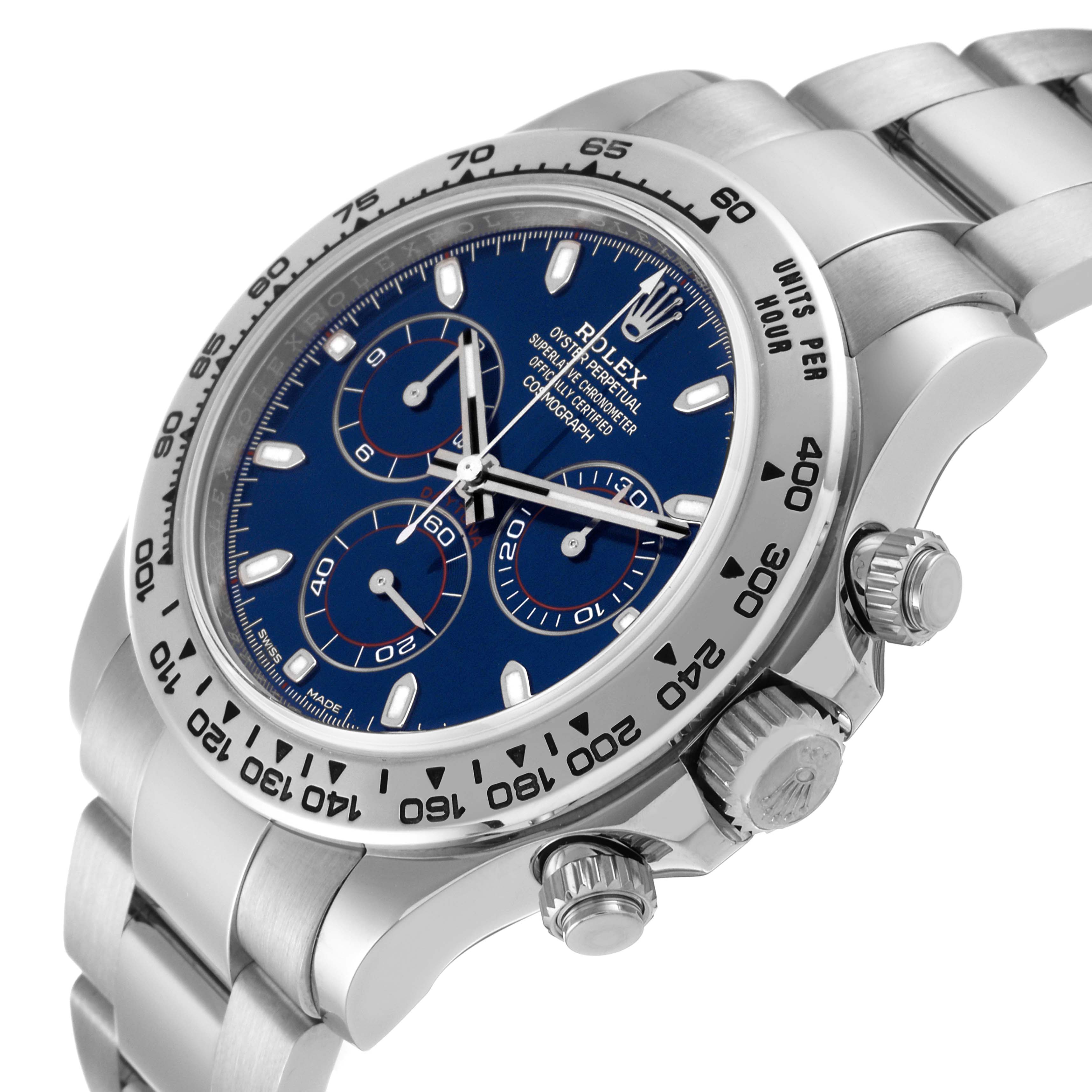 The image shows a close-up angled view of a Rolex Daytona 116509 Men's White Gold Blue Dial 116509 Men's White Gold Blue Dial watch, highlighting the bezel, crown, and bracelet.