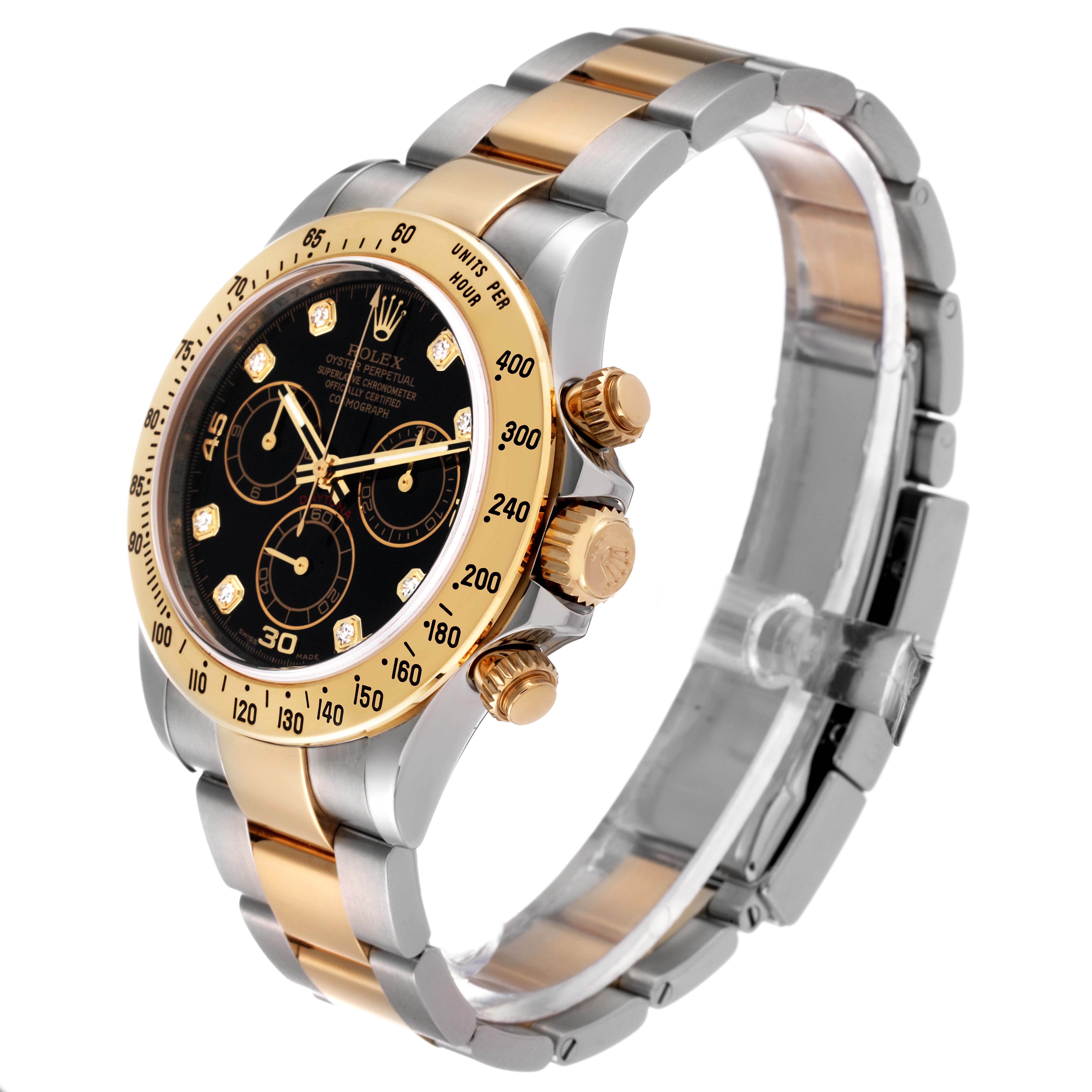 The image shows a Rolex Daytona 116523 Men
s Steel and Gold (two tone) Black Dial 116523 Men
s Steel and Gold (two tone) Black Dial watch from a slightly angled side view, highlighting the face, bezel, and bracelet.