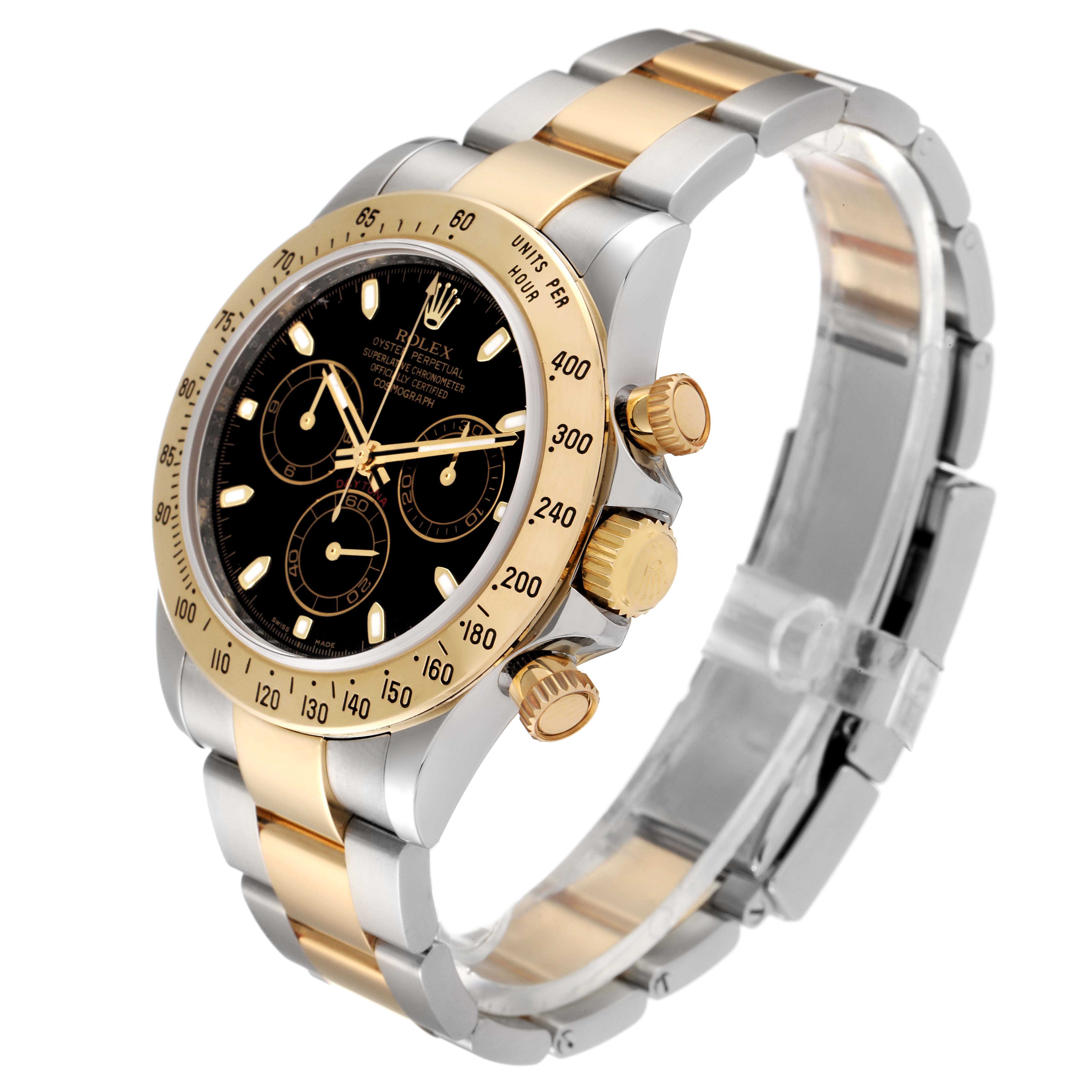 This image shows a Rolex Daytona 116523 Men
s Steel and Gold (two tone) Black Dial 116523 Men
s Steel and Gold (two tone) Black Dial watch at a three-quarter angle, highlighting its gold and silver bracelet, black dial, and bezel.