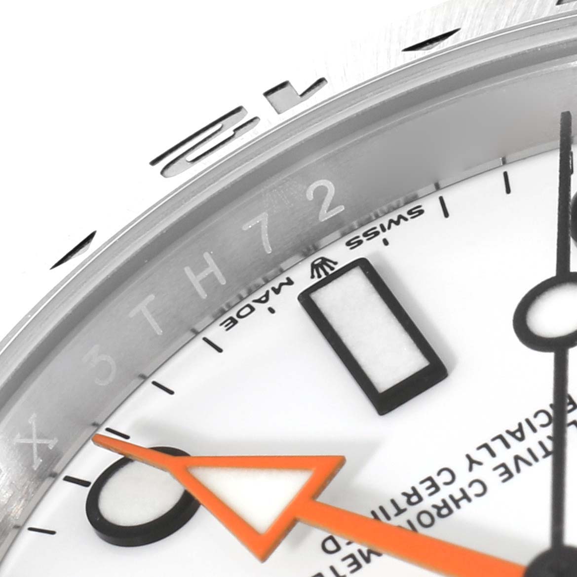 The image shows a close-up of the dial and bezel of a Rolex Explorer 226570 Men
s Stainless Steel White Dial 226570 Men
s Stainless Steel White Dial watch, highlighting the orange arrow second hand and markings.