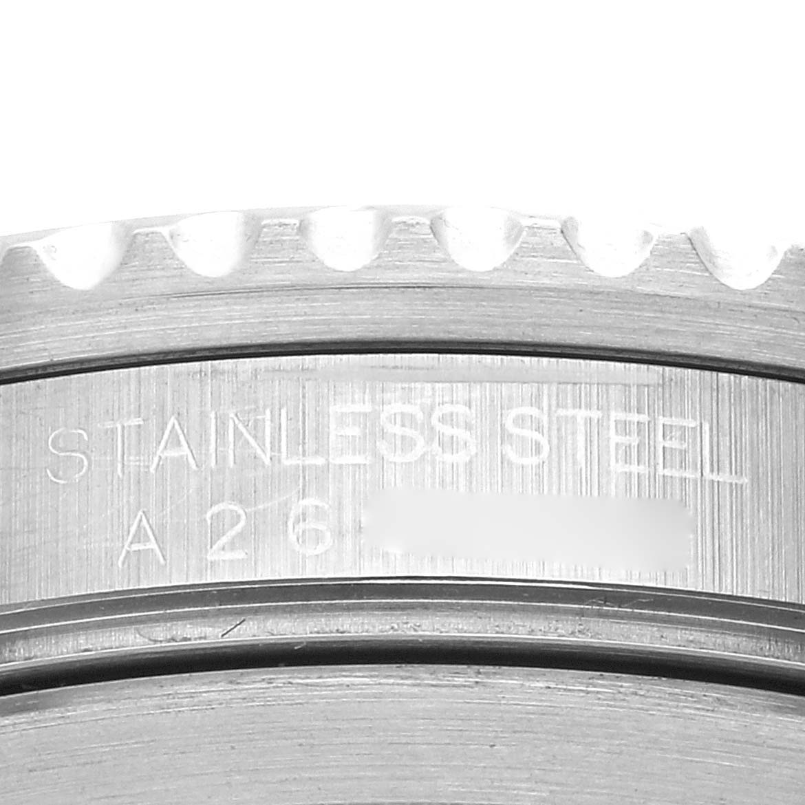 The image shows a close-up view of the stainless steel casing and the serrated bezel edge of the Rolex GMT-Master 16700 Men
s Stainless Steel Black Dial 16700 Men
s Stainless Steel Black Dial watch.