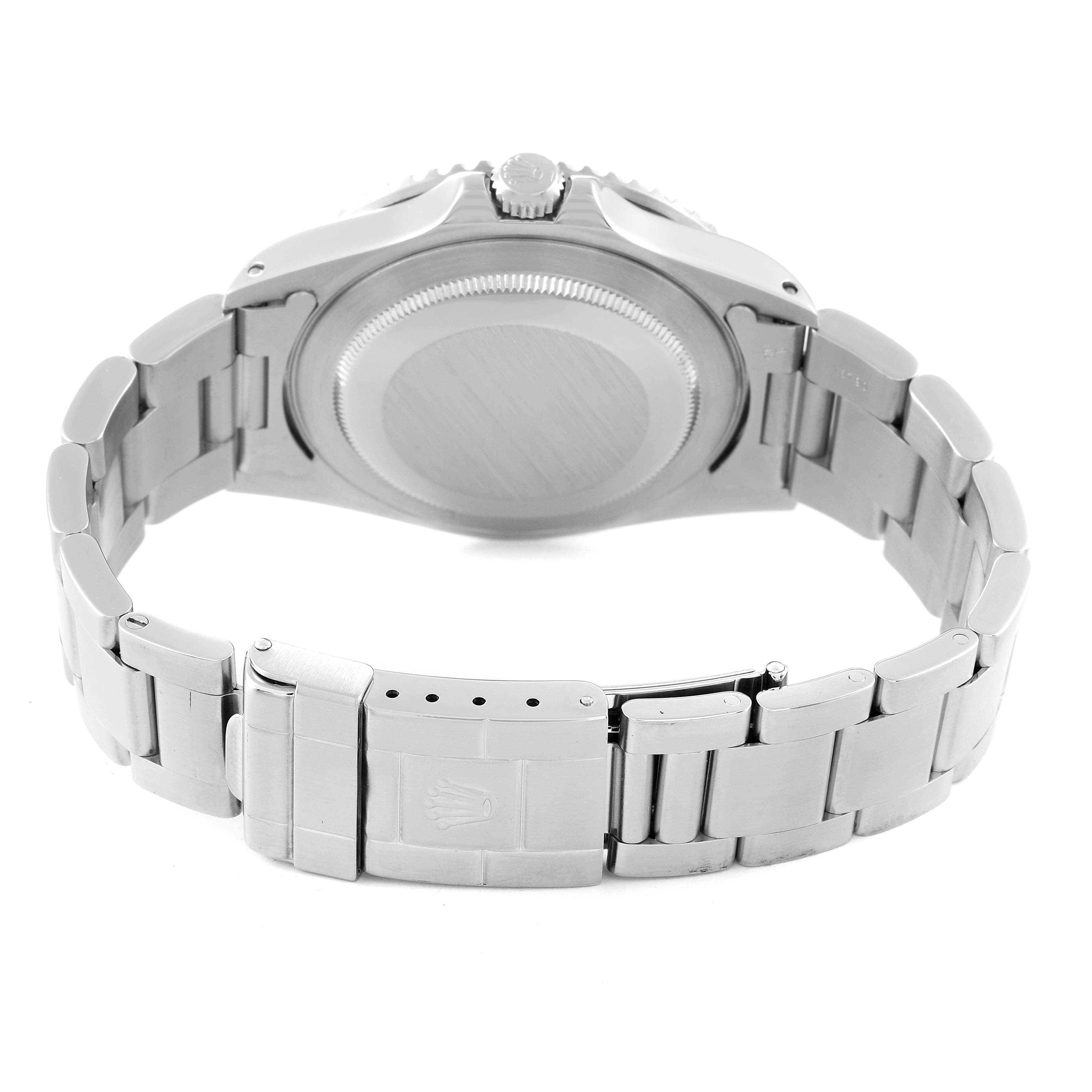 The image shows the back view of a Rolex GMT-Master 16700 Men
s Stainless Steel Black Dial 16700 Men
s Stainless Steel Black Dial watch, highlighting the case back and stainless steel bracelet with the clasp opened.