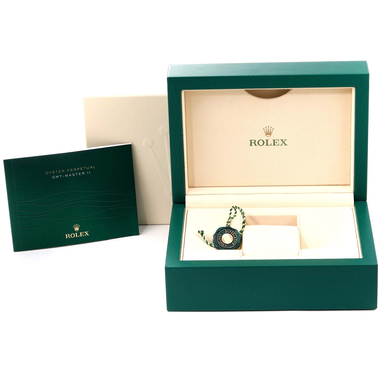 This image shows the packaging and accessories for a Rolex GMT-Master 116710 Men
s Stainless Steel Black Dial 116710 Men
s Stainless Steel Black Dial, including the box, booklet, and tag.