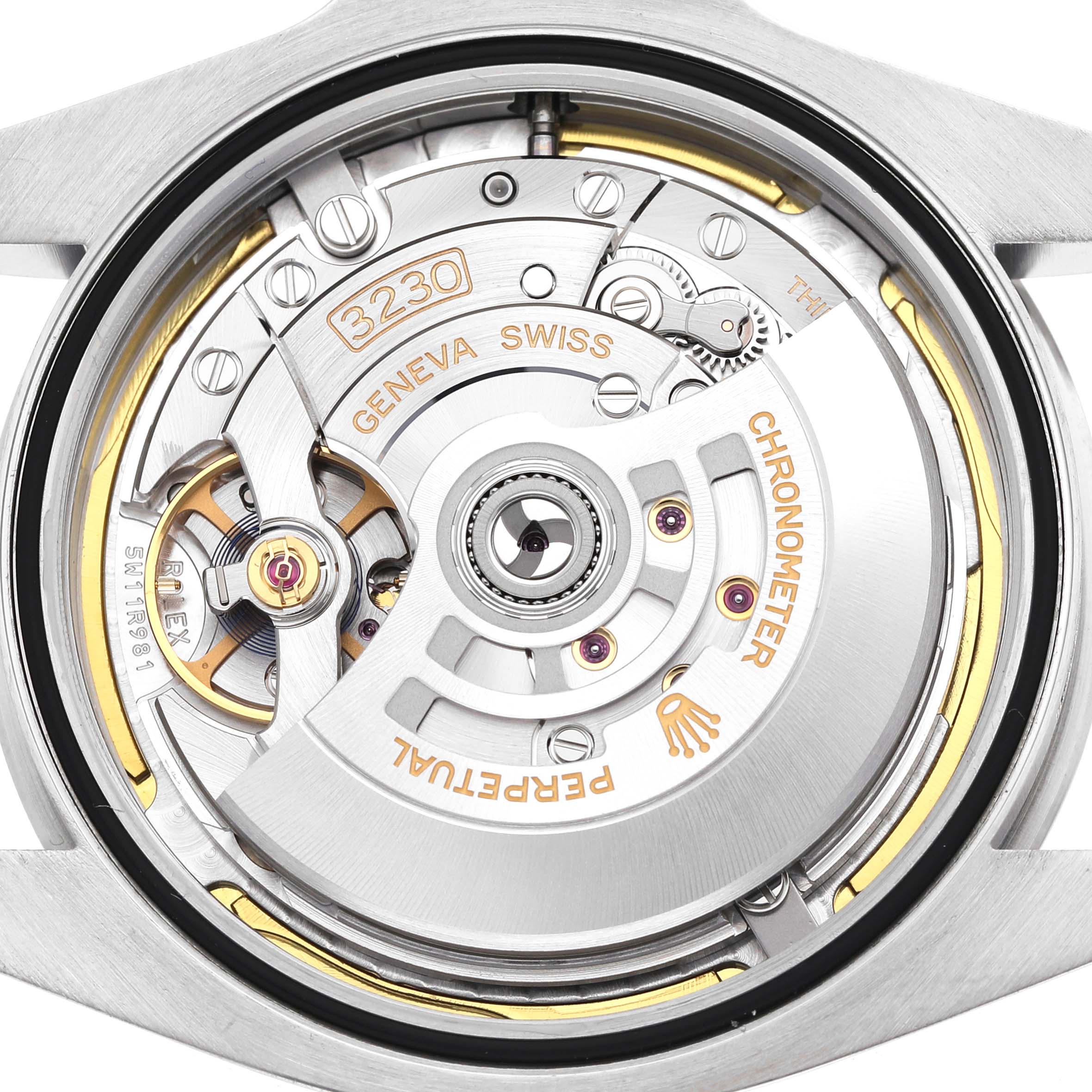 The image shows the Rolex Air-King 126900 Men's Stainless Steel Black Dial watch's movement from the back, highlighting the rotor and intricate internal components.