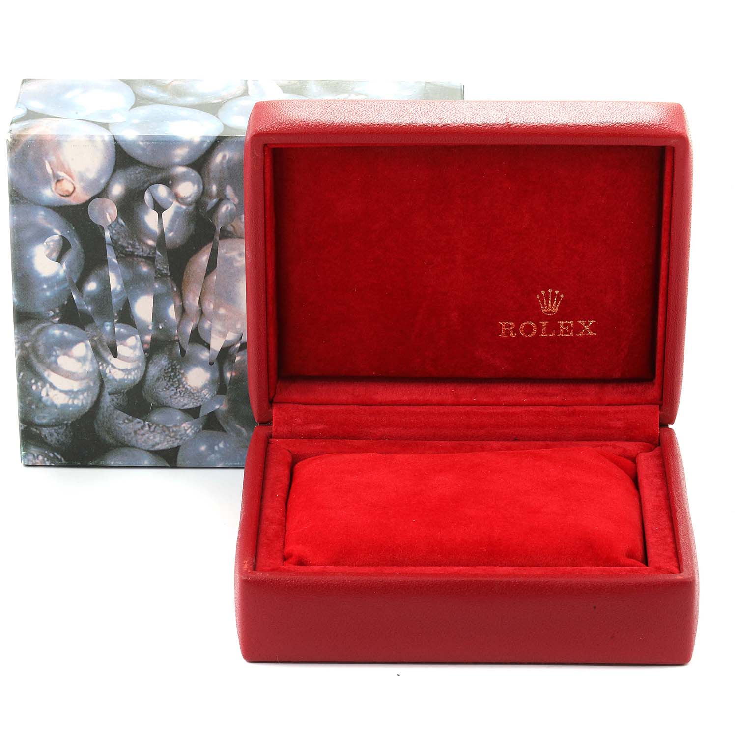 This image shows a red Rolex watch box for the Oyster Perpetual model with its interior open.