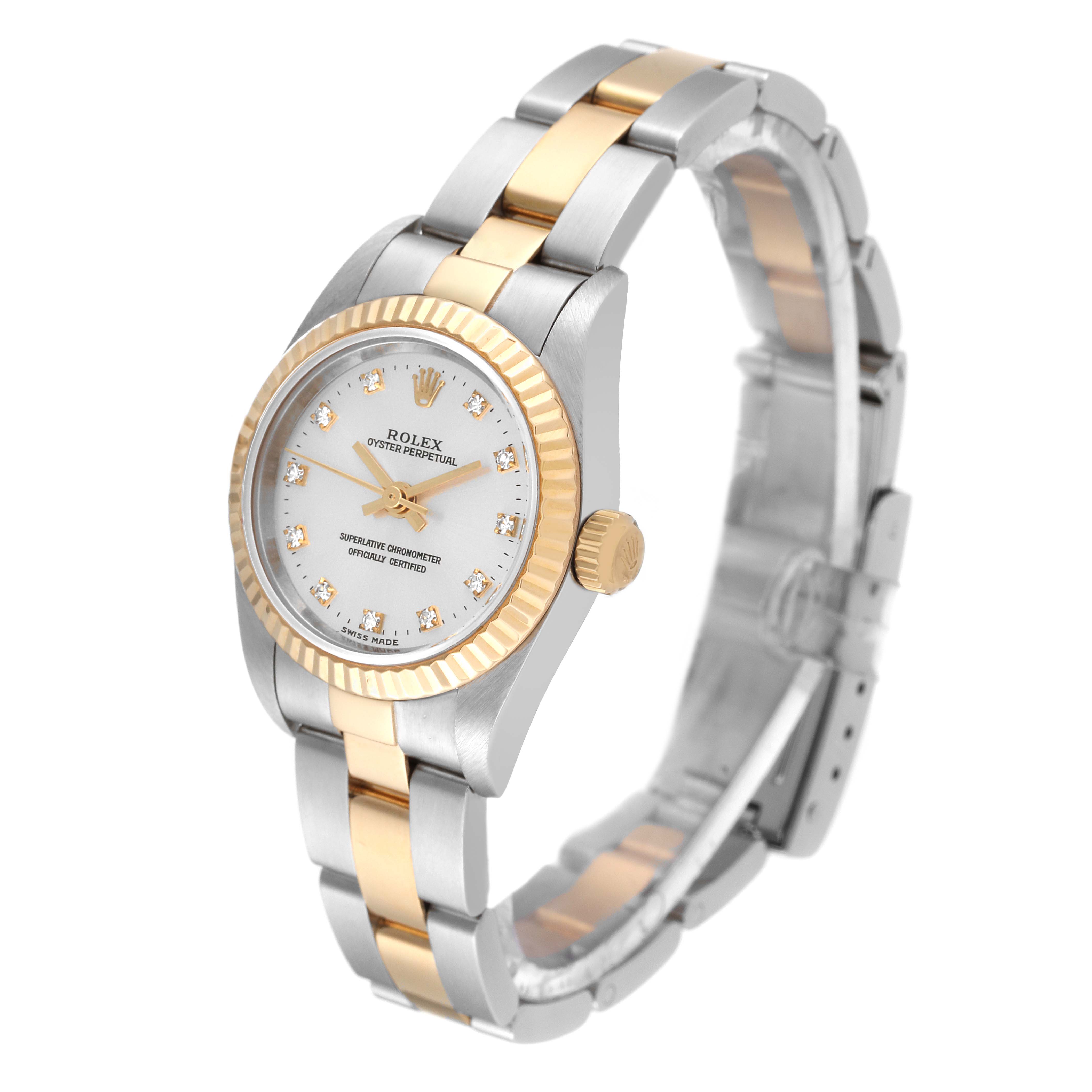 The image shows a Rolex Oyster Perpetual 76193 Women's Steel and Gold (two tone) Silver Dial 76193 Women's Steel and Gold (two tone) Silver Dial watch with a silver and gold bracelet, viewed from the front left side angle.