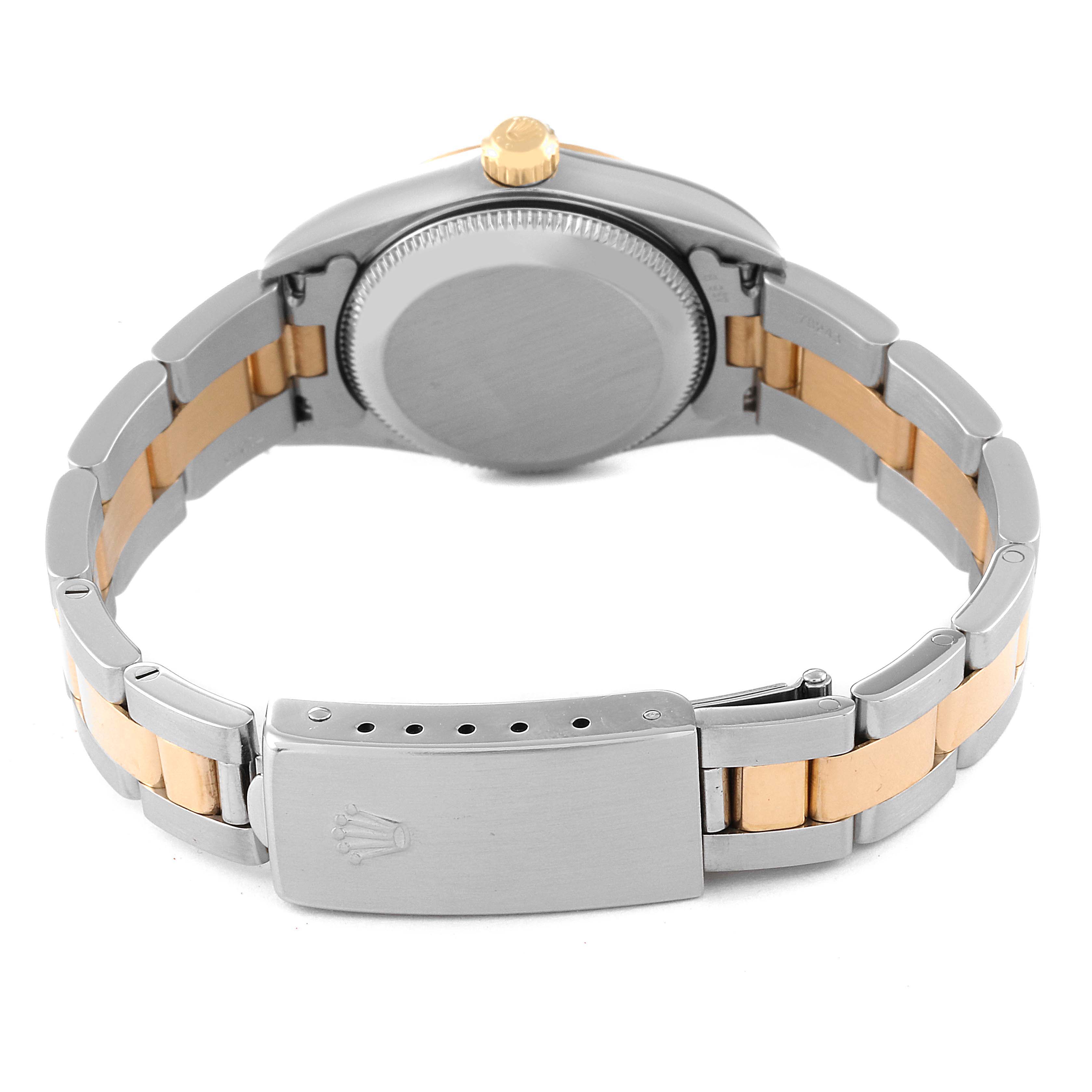 The image shows the back of a Rolex Oyster Perpetual 76193 Women's Steel and Gold (two tone) Silver Dial 76193 Women's Steel and Gold (two tone) Silver Dial watch, highlighting the case back, bracelet, and clasp.