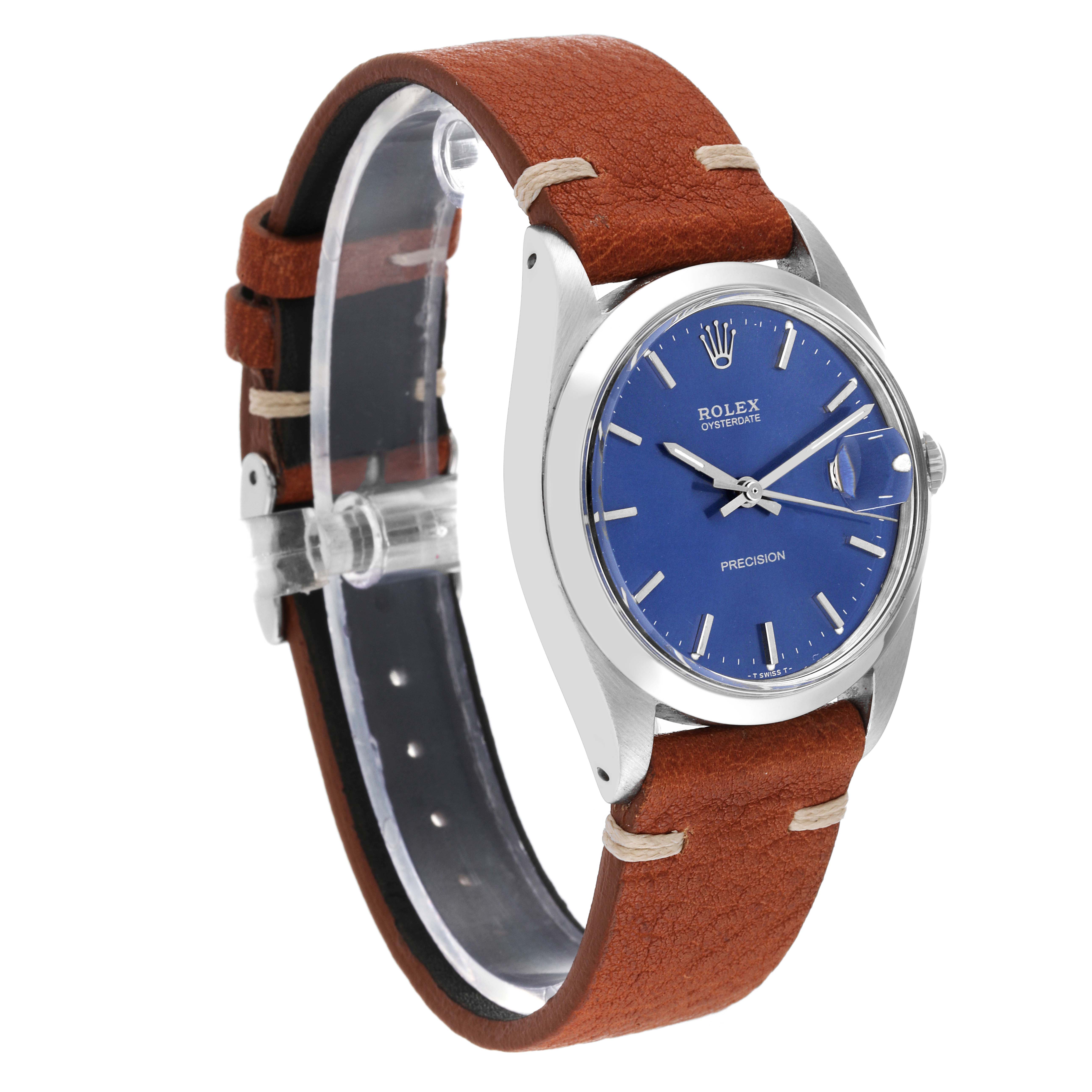 The Vintage Collection model by Rolex is shown from a front-side angle, highlighting its blue dial, silver case, and brown leather strap.