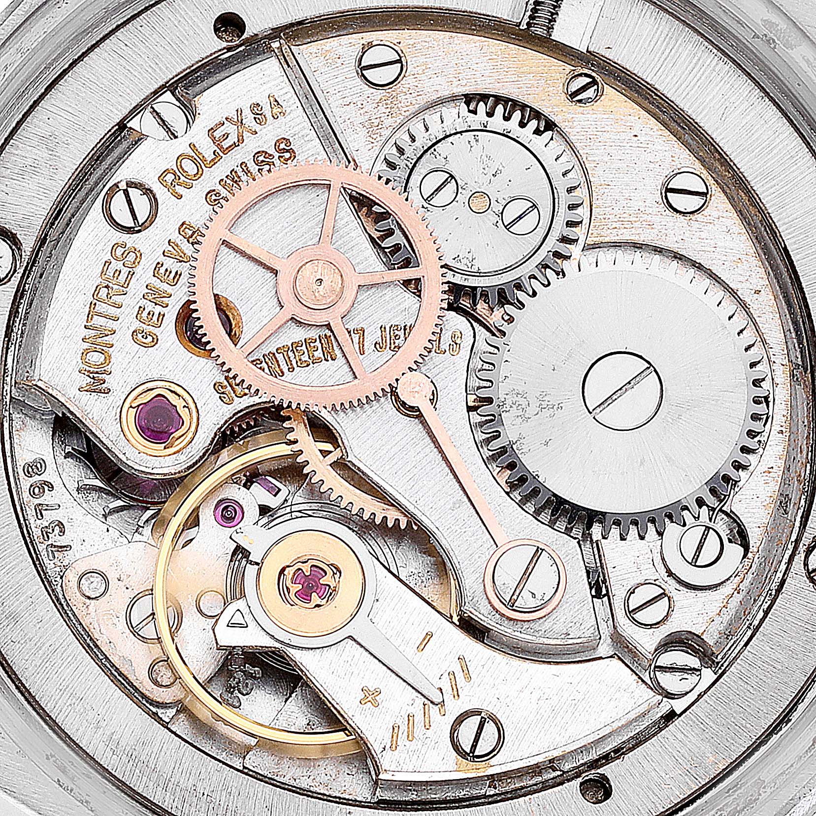 This image shows an up-close view of the Vintage Collection model by Rolex, focusing on its intricate internal movement and gears.