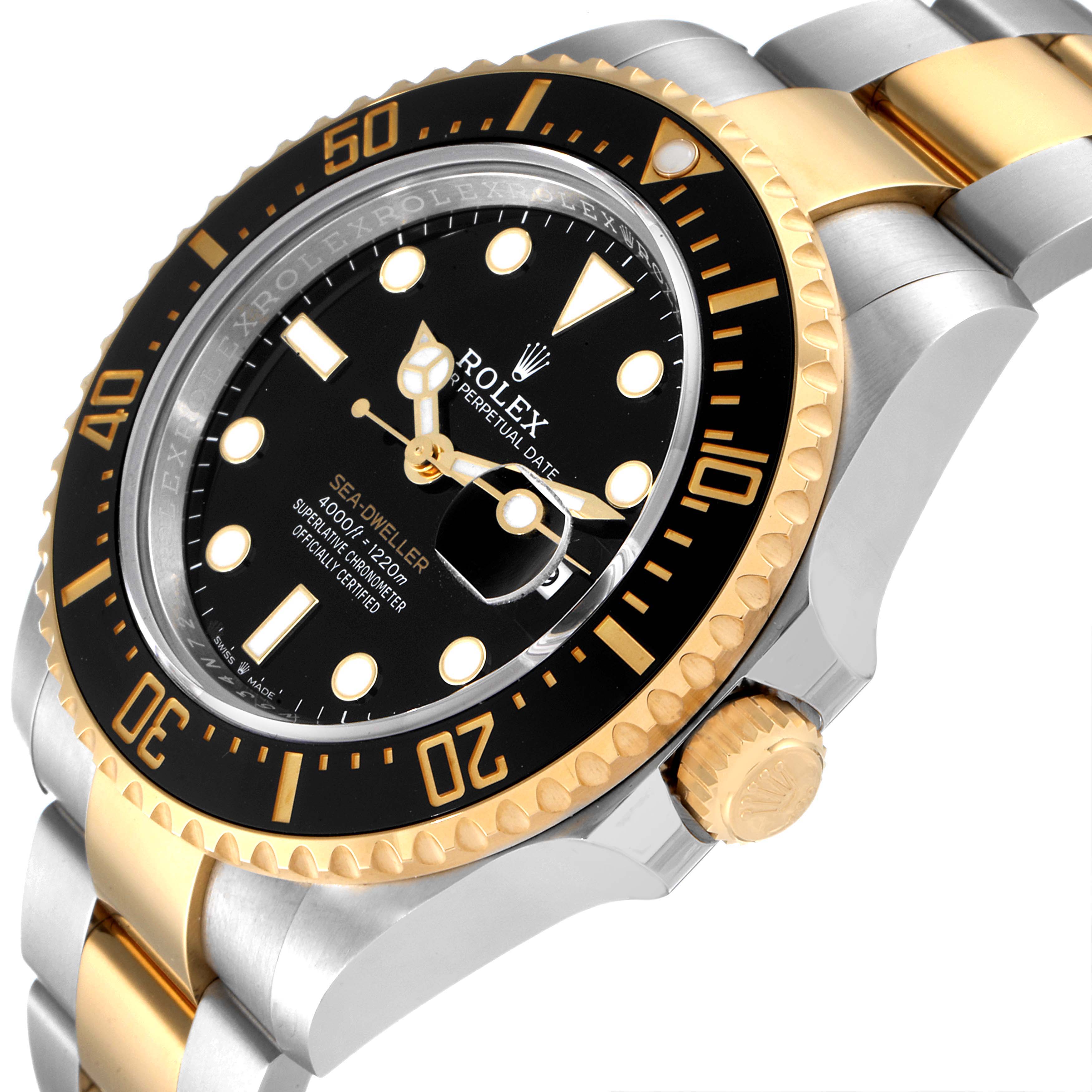 The image shows a close-up angle of the Rolex Sea-Dweller 126603 Men
s Steel and Gold (two tone) Black Dial 126603 Men
s Steel and Gold (two tone) Black Dial watch, highlighting the dial, bezel, and bracelet.