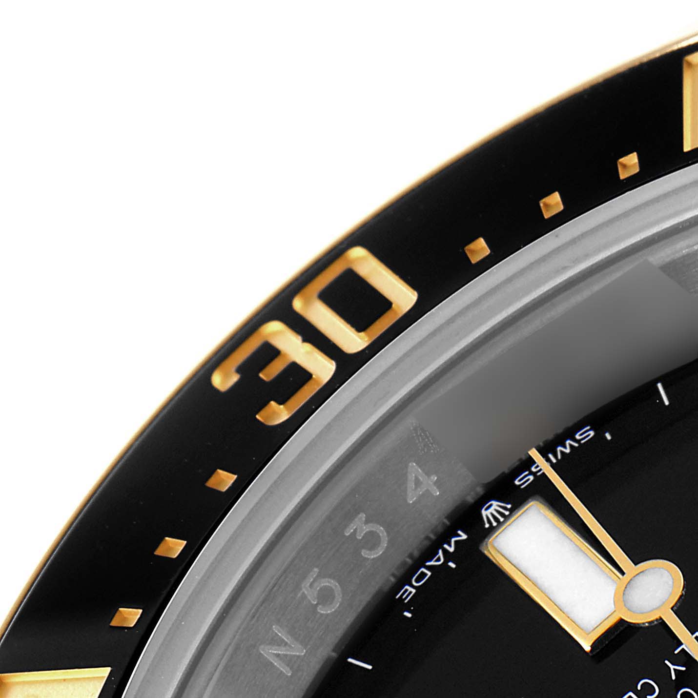 The image shows a close-up of the bezel and part of the dial for the Rolex Sea-Dweller 126603 Men
s Steel and Gold (two tone) Black Dial 126603 Men
s Steel and Gold (two tone) Black Dial watch, highlighting the 30-minute marker.