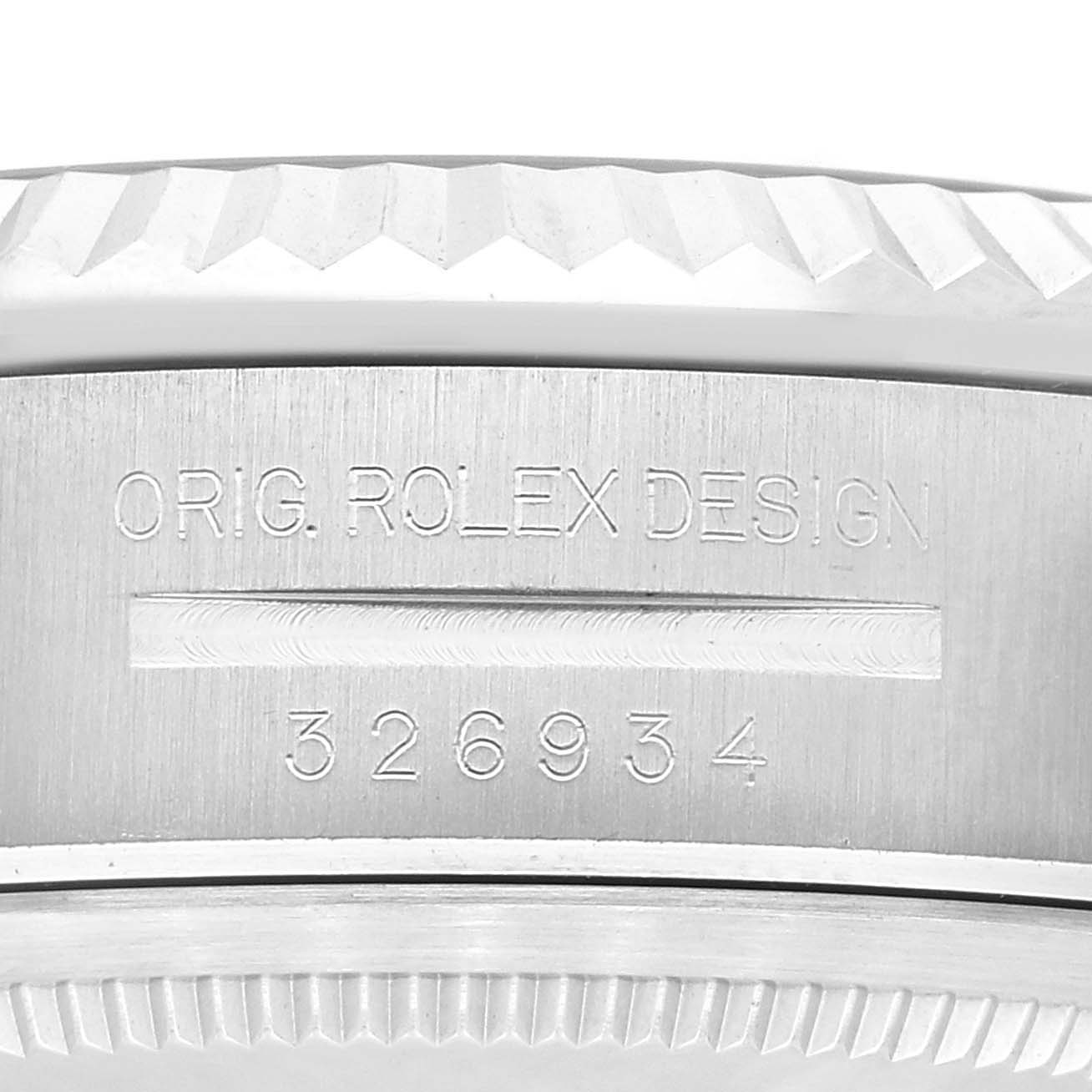 The image shows a close-up of the side case of a Rolex Sky-Dweller 326934 Men's Stainless Steel Blue Dial 326934 Men's Stainless Steel Blue Dial, displaying the model number "326934" and "ORIG. ROLEX DESIGN" engraving.