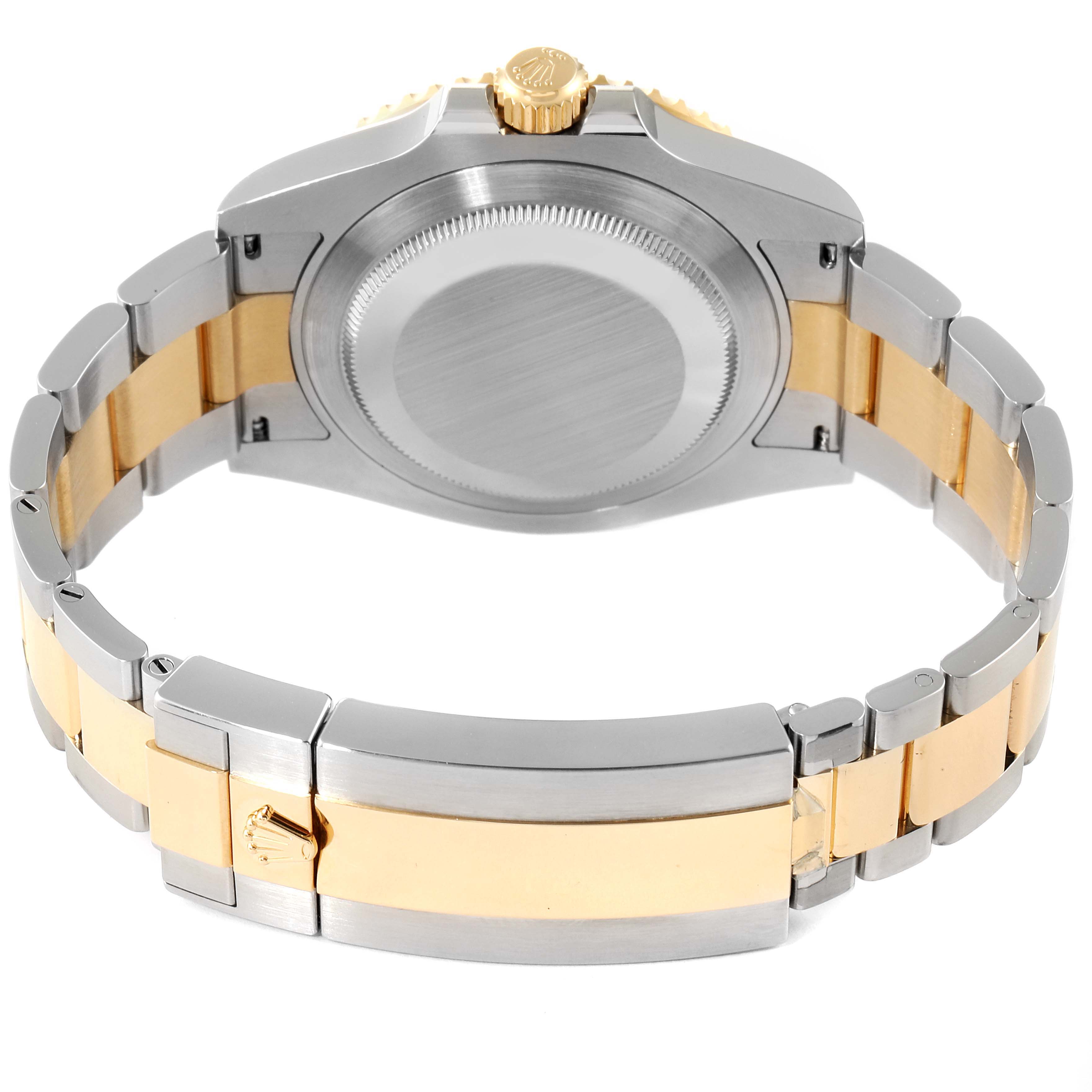 The image shows the back case and bracelet of a Rolex Submariner 126613 Men
s Steel and Gold (two tone) Blue Dial 126613 Men
s Steel and Gold (two tone) Blue Dial watch, highlighting its two-tone (gold and stainless steel) design.