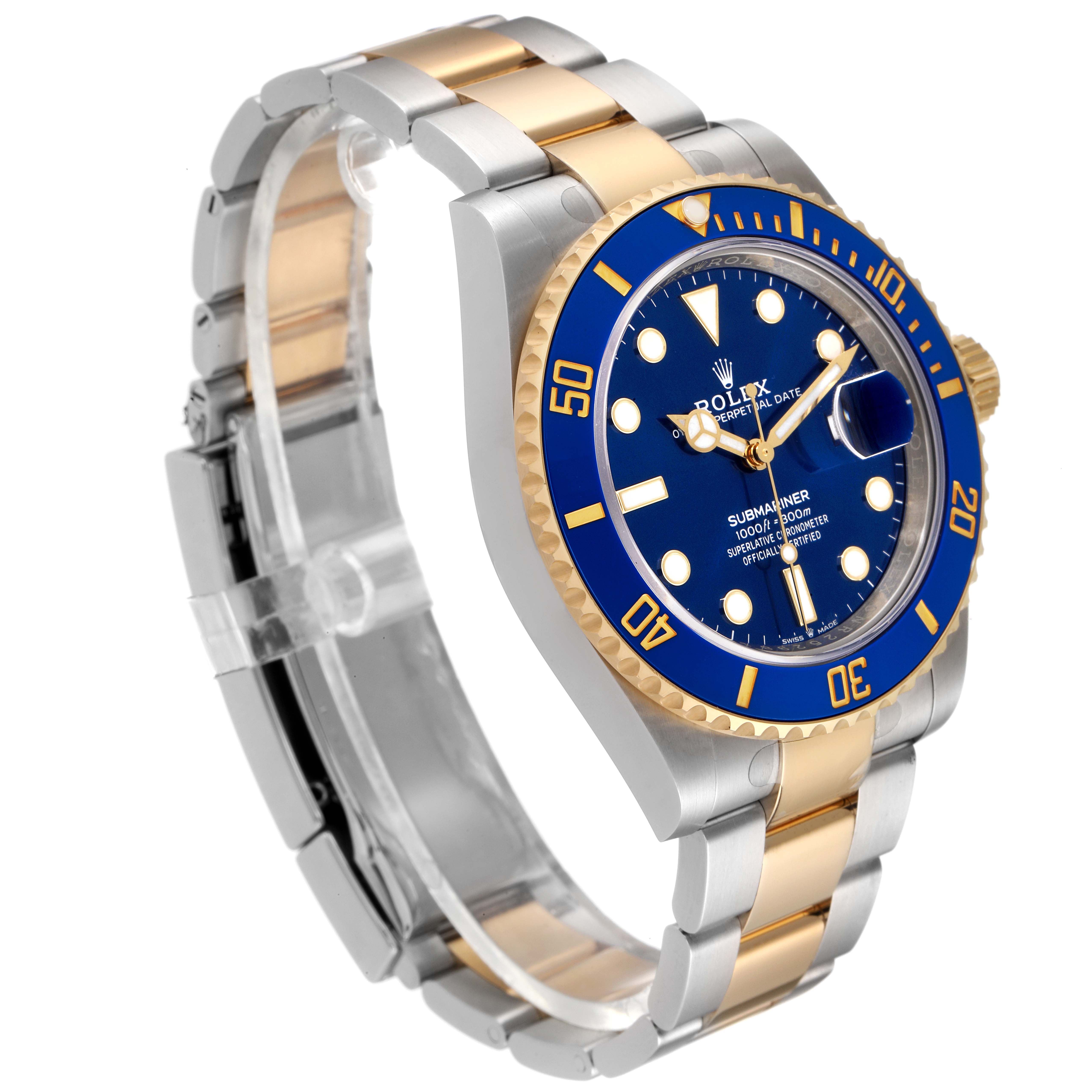 The image shows a Rolex Submariner 126613 Men
s Steel and Gold (two tone) Blue Dial 126613 Men
s Steel and Gold (two tone) Blue Dial watch at a slight angle, displaying its blue dial, two-tone bracelet, and rotating bezel.
