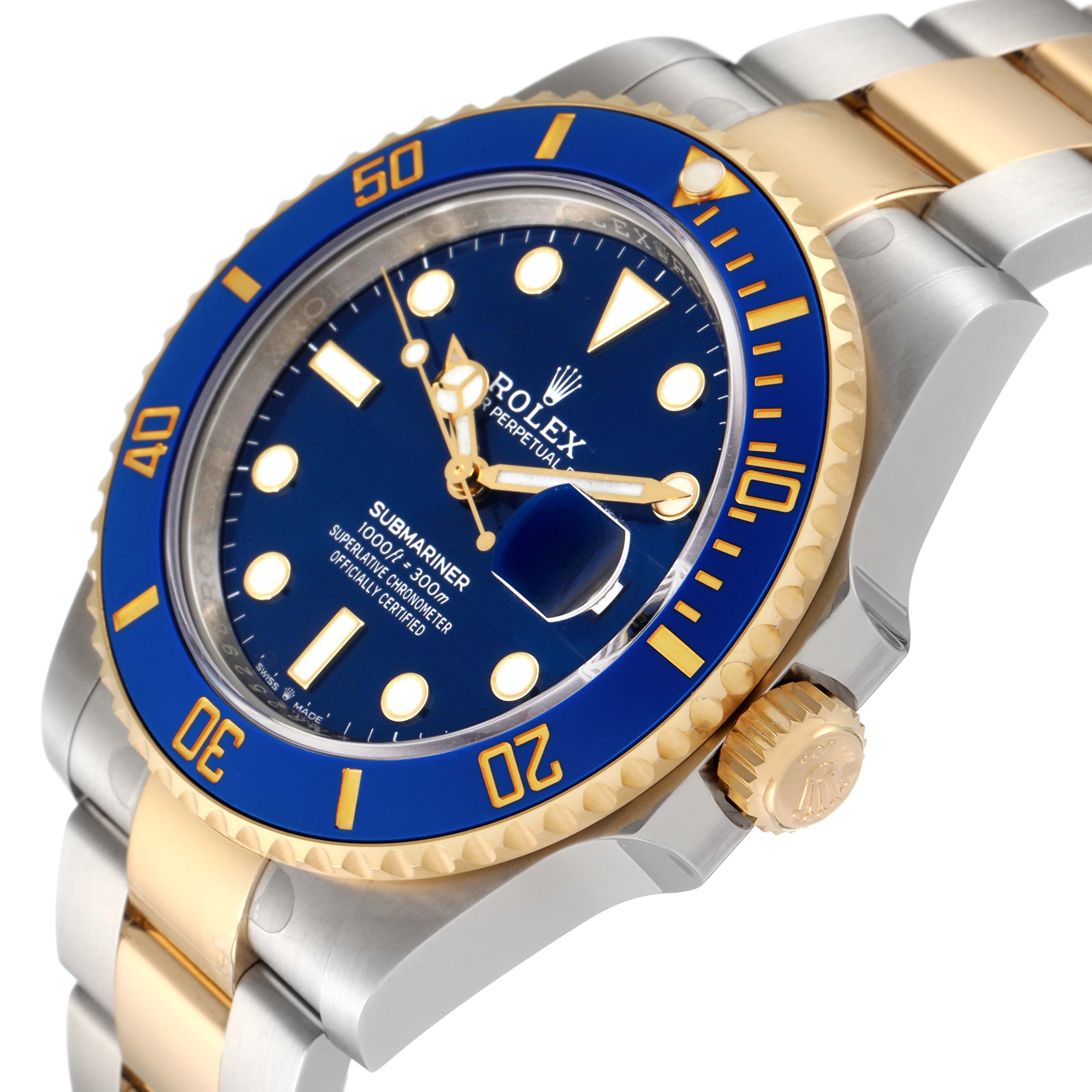The image shows the face, bezel, and part of the bracelet of a Rolex Submariner 126613 Men
s Steel and Gold (two tone) Blue Dial 126613 Men
s Steel and Gold (two tone) Blue Dial watch at a slight angle.