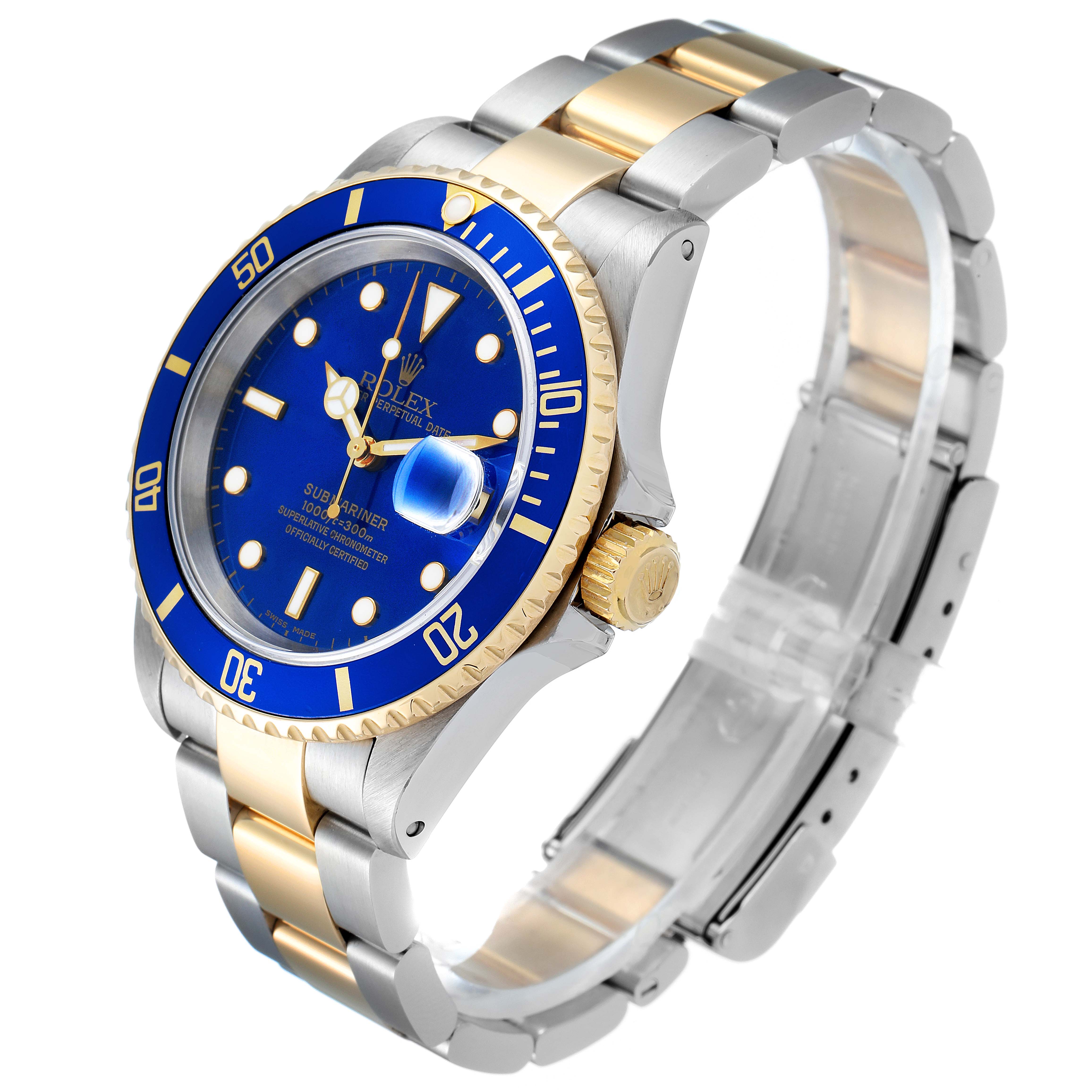 The image shows a Rolex Submariner 16613 Men's Steel and Gold (two tone) Blue Dial 16613 Men's Steel and Gold (two tone) Blue Dial watch at a three-quarter angle, highlighting its blue dial, gold bezel, and two-tone metal bracelet.