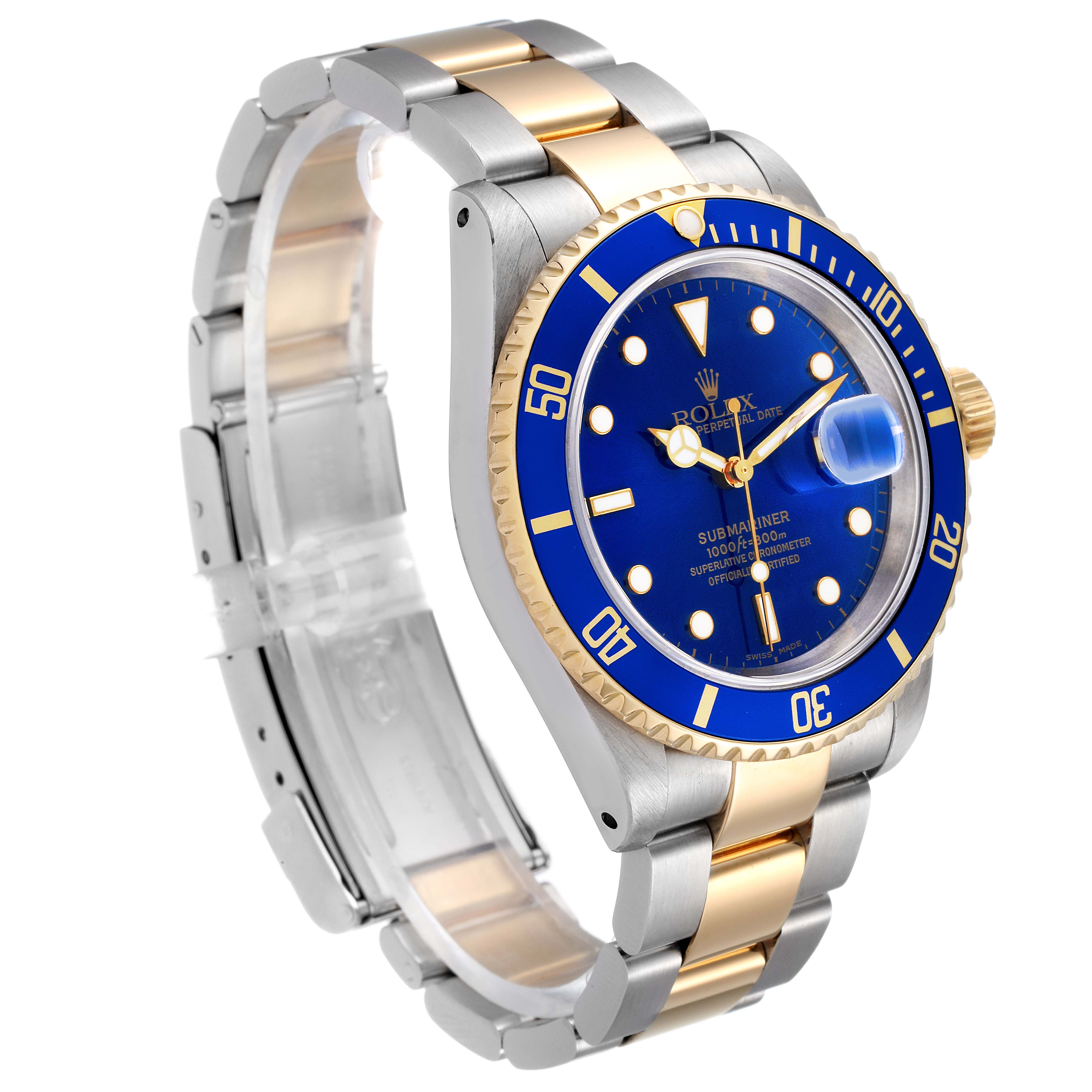 The image shows a Rolex Submariner 16613 Men's Steel and Gold (two tone) Blue Dial 16613 Men's Steel and Gold (two tone) Blue Dial watch at a 3/4 angle, highlighting its two-tone bracelet, blue dial, and rotating bezel.