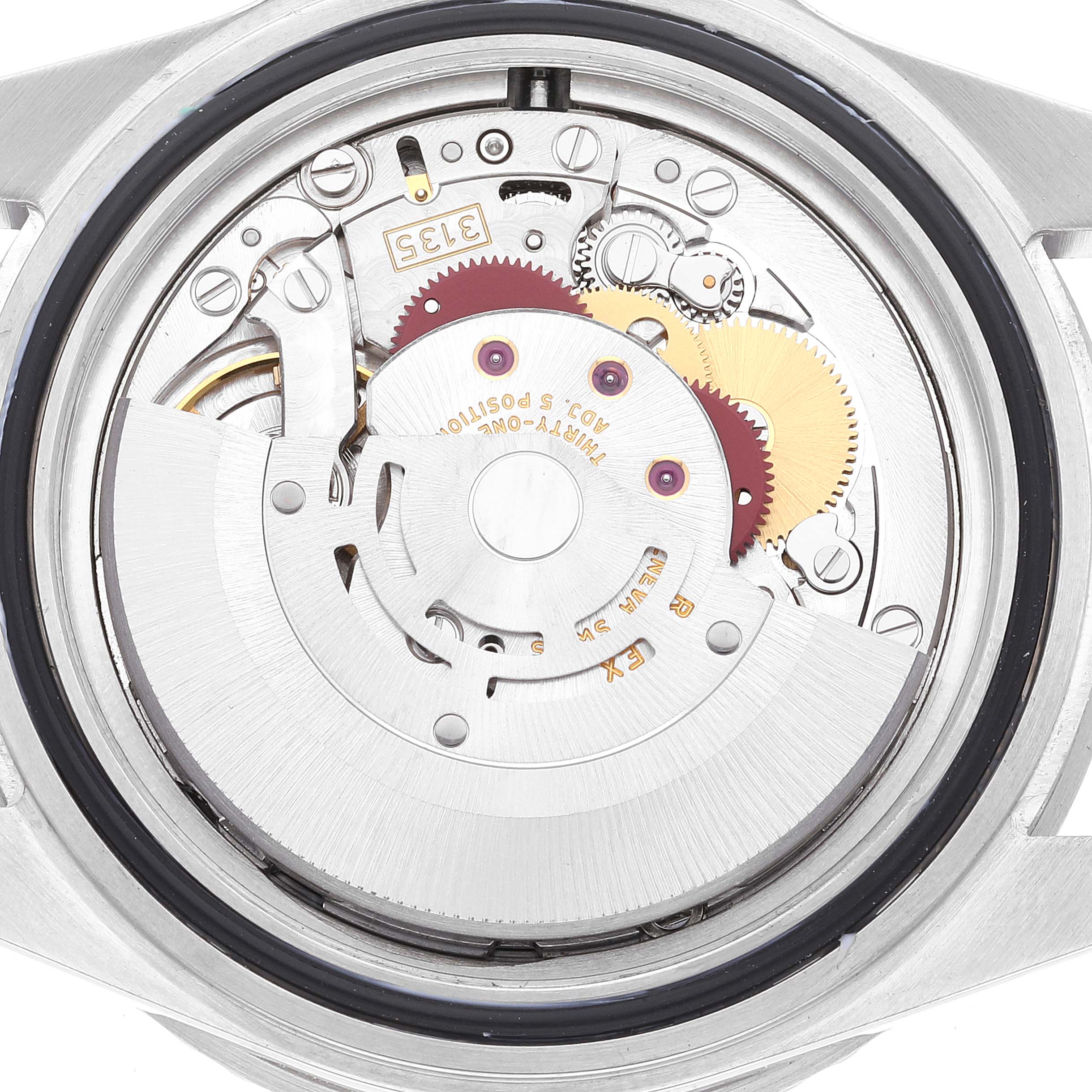 This image displays the exposed movement of a Rolex Submariner 16610 Men
s Stainless Steel Black Dial 16610 Men
s Stainless Steel Black Dial watch, showing its intricate gears and internal components.