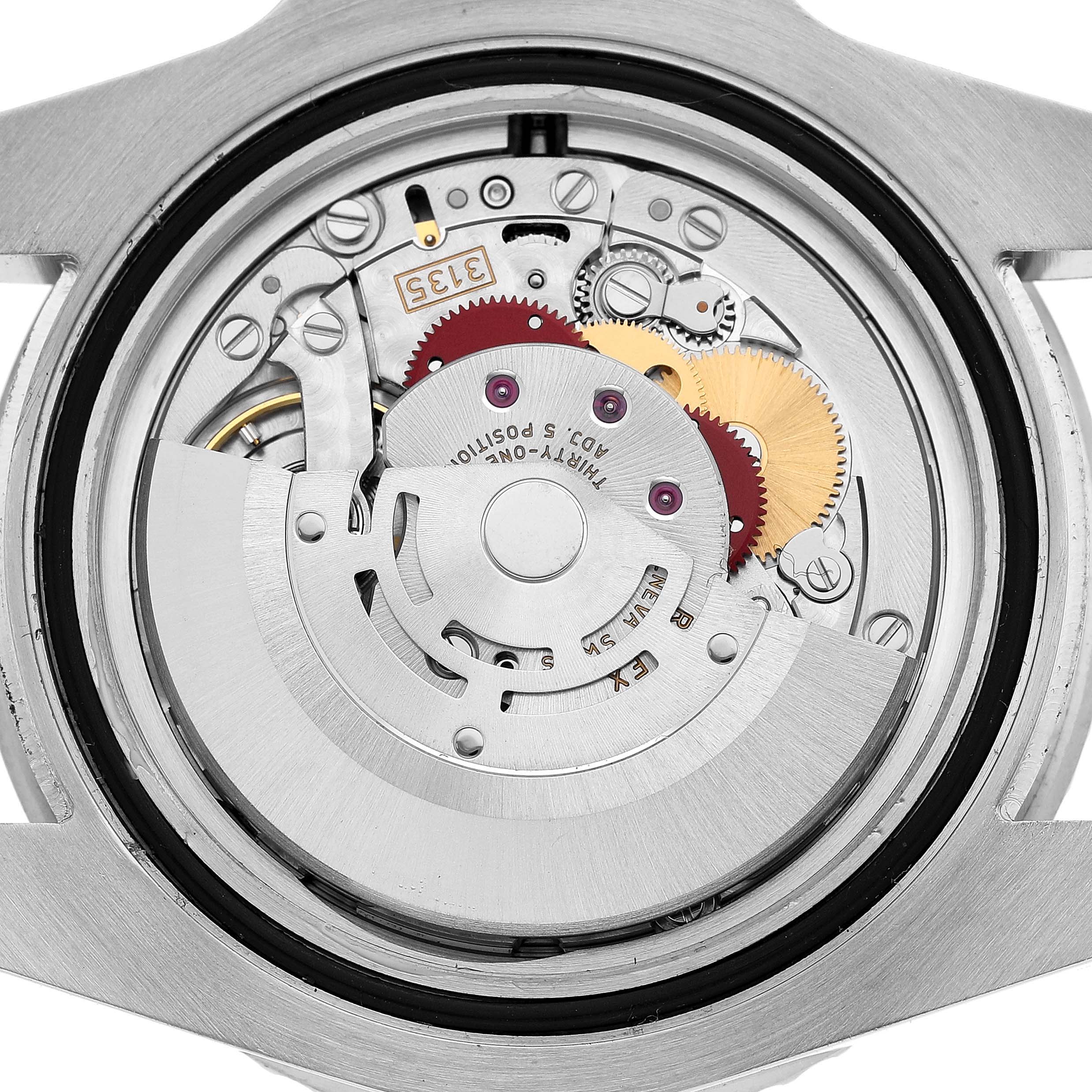 The image shows the movement of a Rolex Submariner 116610 Men's Stainless Steel Black Dial from the back, revealing gears and the rotor.