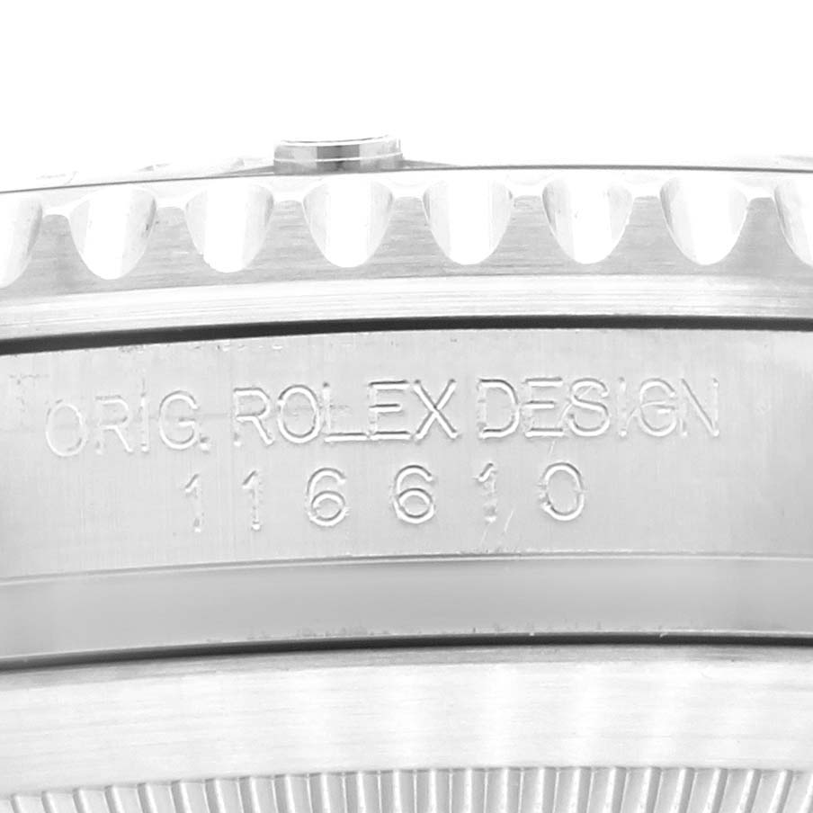 Close-up of the bezel and case side of a Rolex Submariner 116610LV Men
s Stainless Steel Green Dial 116610LV Men
s Stainless Steel Green Dial showing the engraved model number and "ORIG. ROLEX DESIGN".