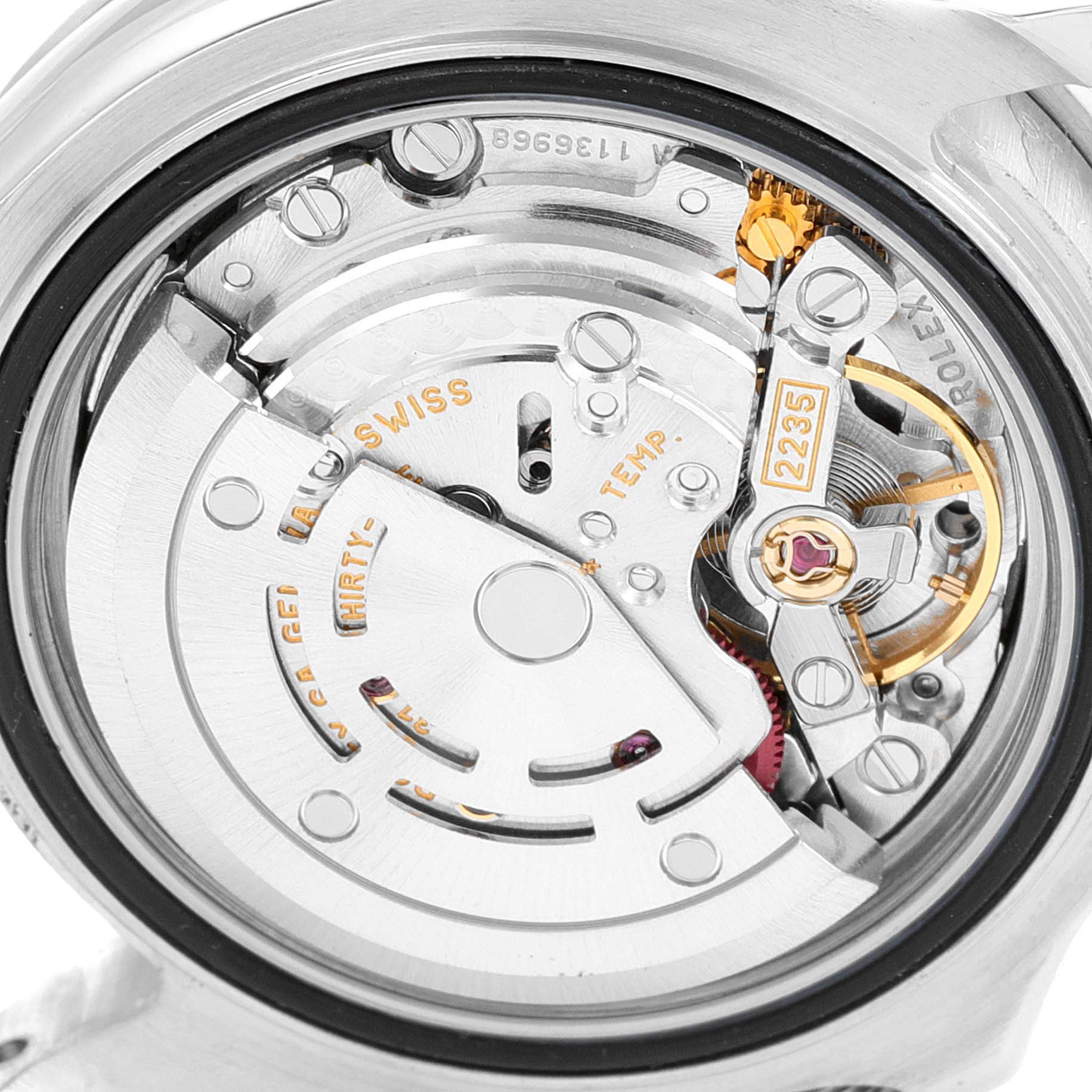 This image shows a close-up view of the movement from a Rolex Yacht-Master 169622 Women's Stainless Steel Silver Dial 169622 Women's Stainless Steel Silver Dial watch, highlighting the intricate mechanical parts.