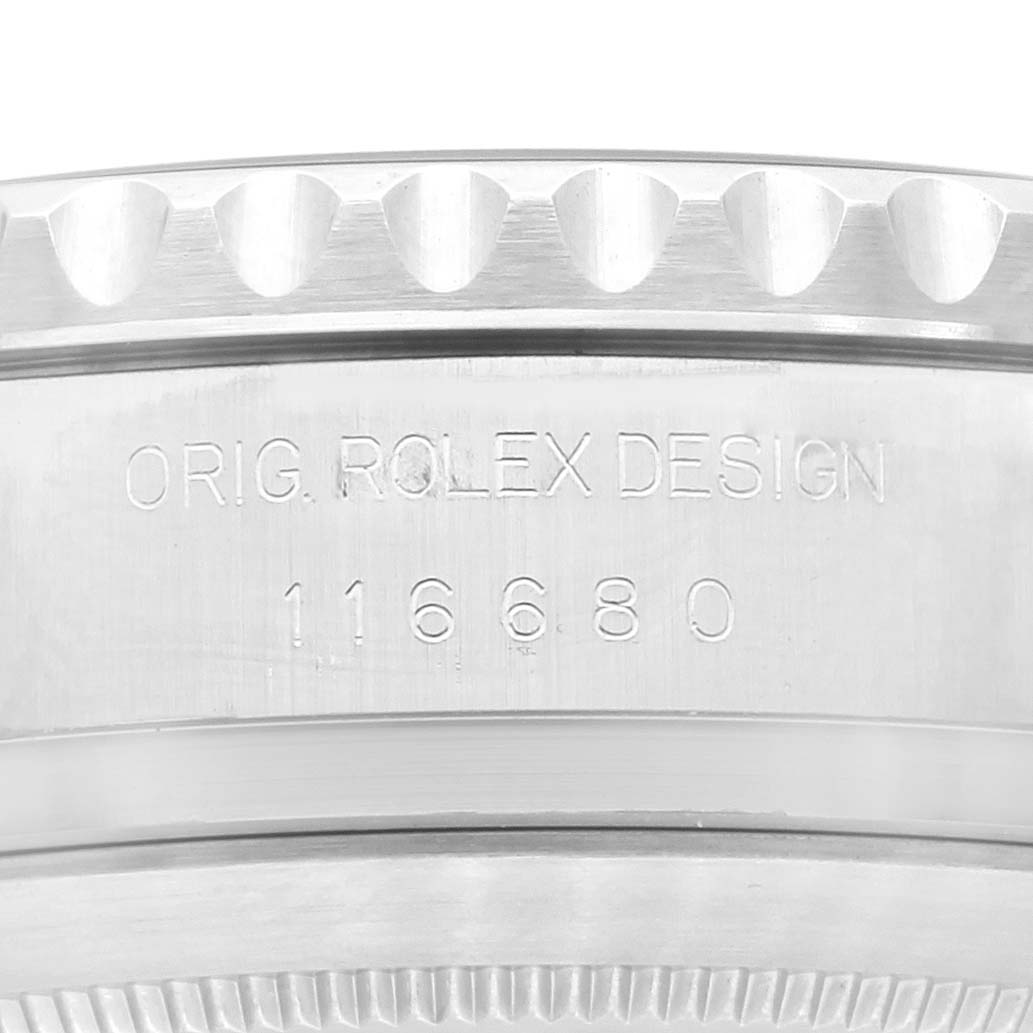 The image shows a close-up of the Rolex Yacht-Master 116680 Men's Stainless Steel White Dial 116680 Men's Stainless Steel White Dial model's serial number engraved on its case edge.