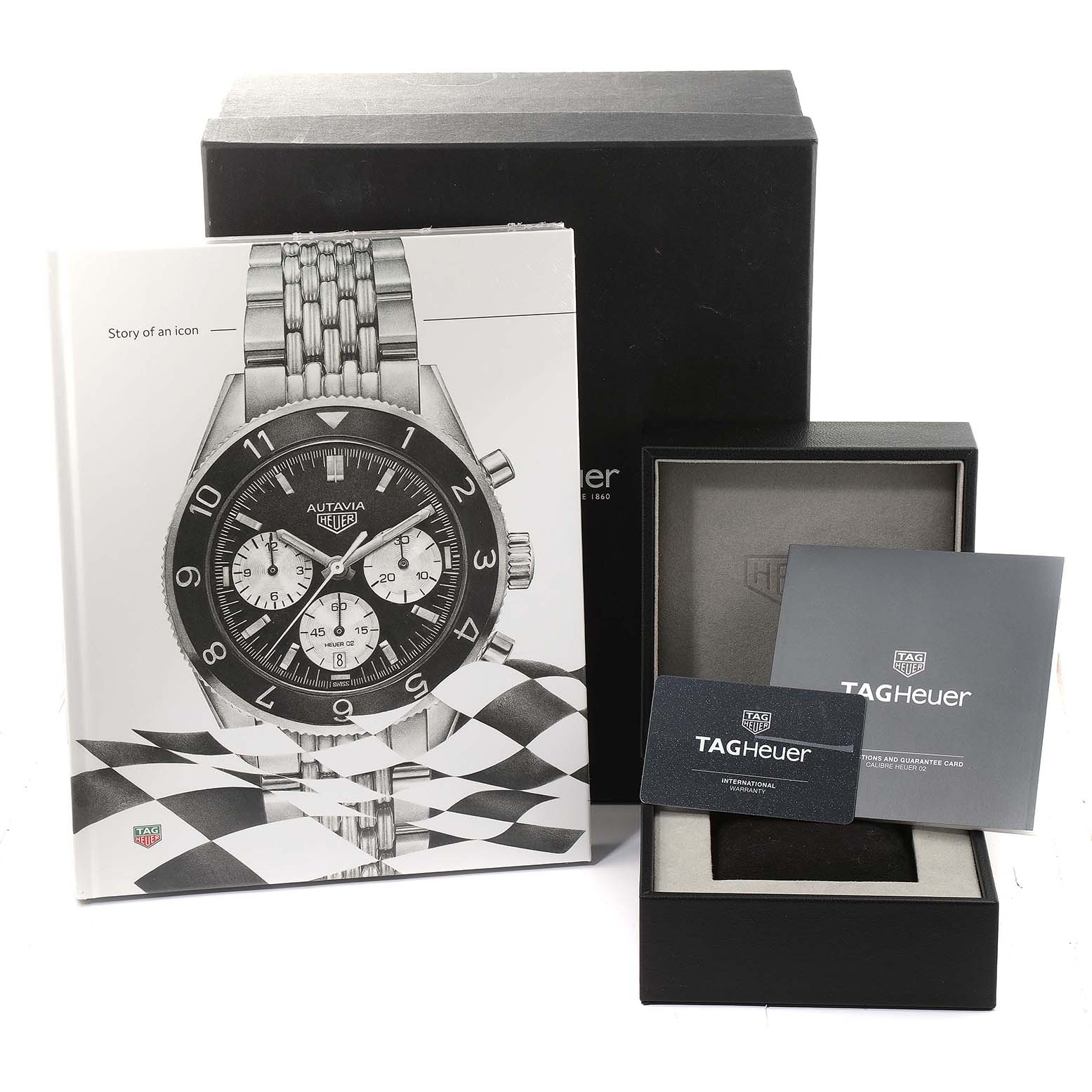 This image shows the Tag Heuer Autavia CBE2111.BA0687 Men's Stainless Steel Silver Dial CBE2111.BA0687 Men's Stainless Steel Silver Dial watch packaging, including a box, booklet, and warranty card.