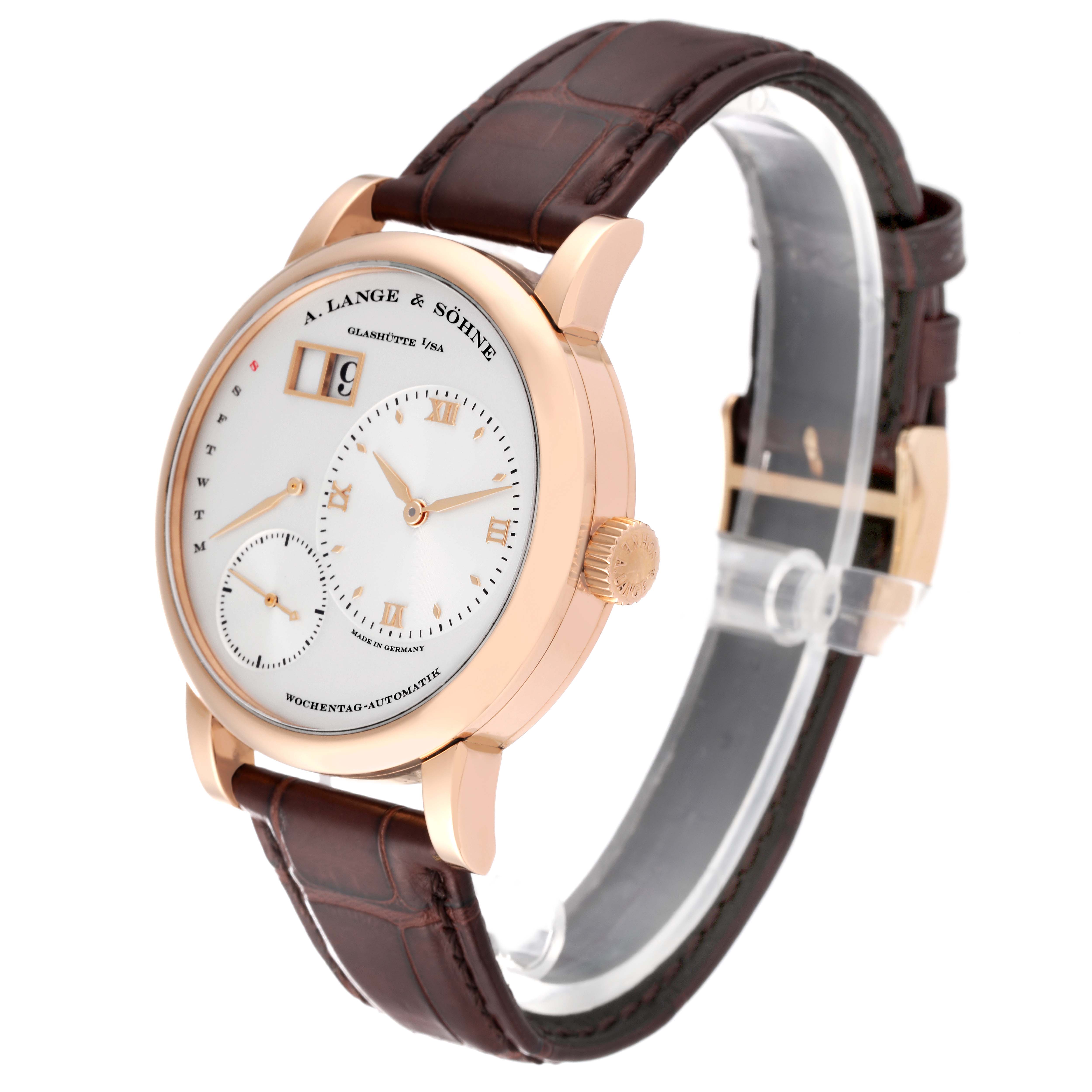 The image shows an angled view of an A. Lange & Sohne Lange 1 watch, highlighting the dial, case, crown, and leather strap.