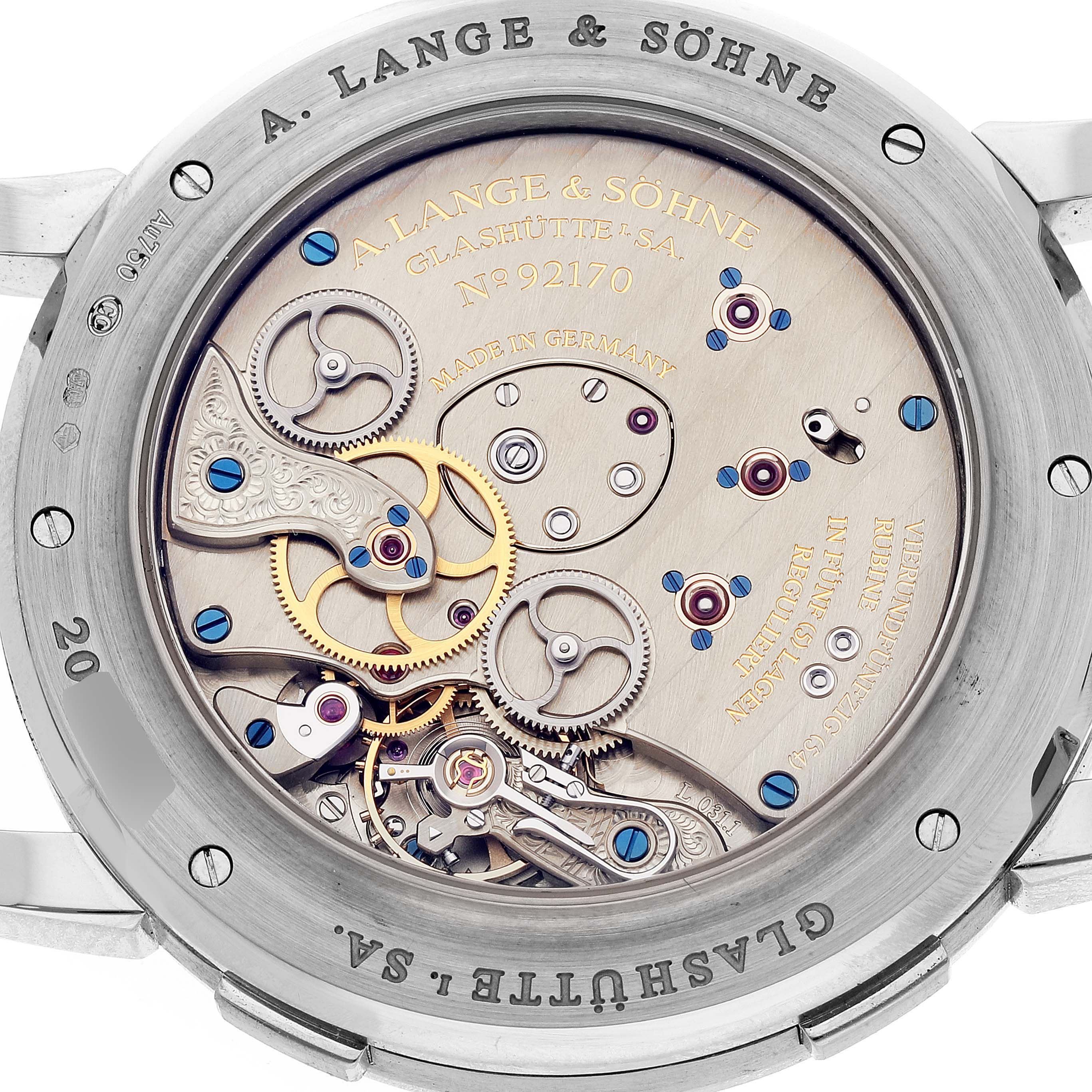 The image shows the back view of a Lange 1 model by A. Lange & Söhne, displaying its intricate movement and mechanical components.