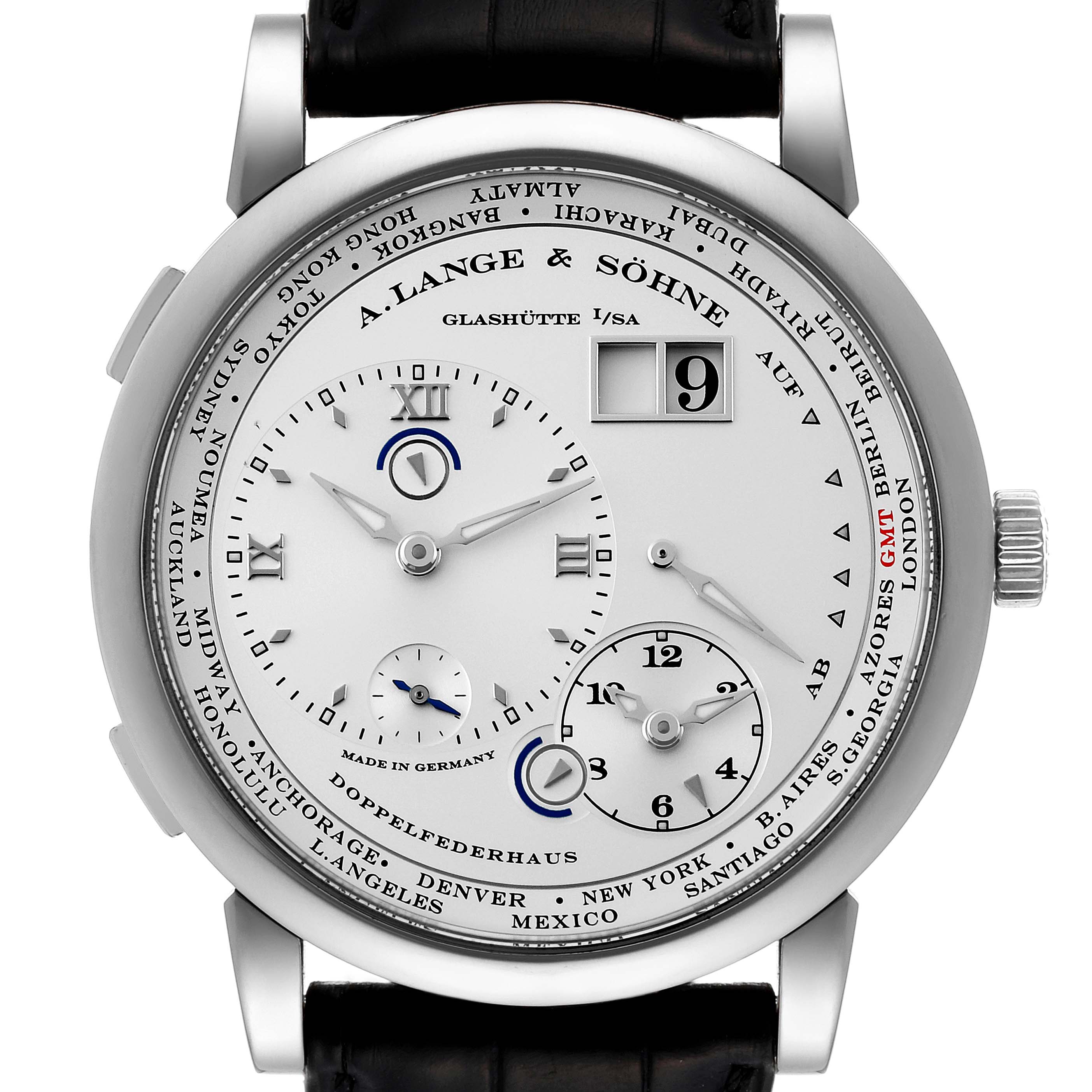 The image shows a top-down view of the Lange 1 model by A. Lange & Söhne, highlighting the dial, hands, and indices.