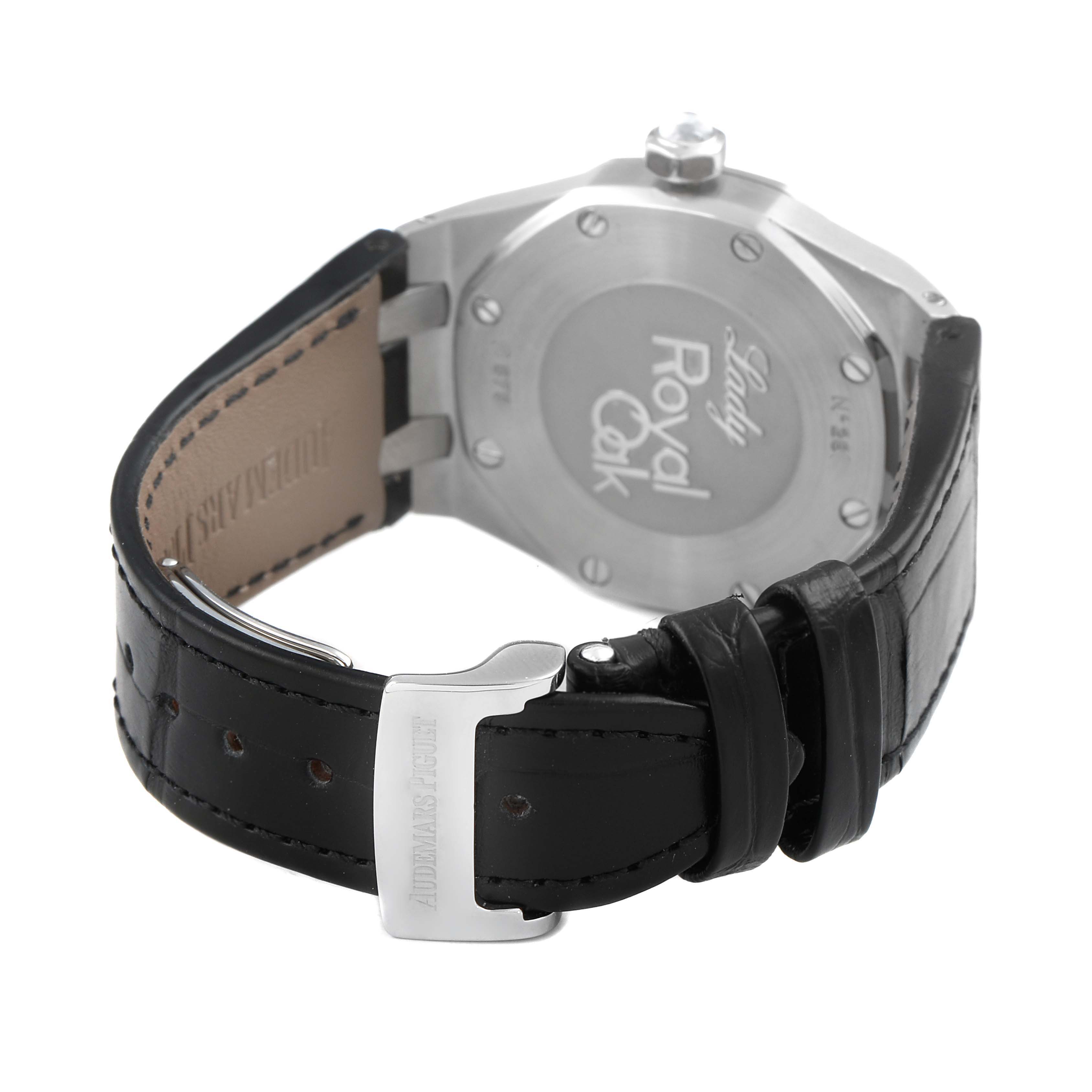 The image shows the back case and clasp of an Audemars Piguet Royal Oak 67601ST.ZZ.D002CR.01 Women's Stainless Steel Black Dial watch from a rear angle, highlighting the leather strap.