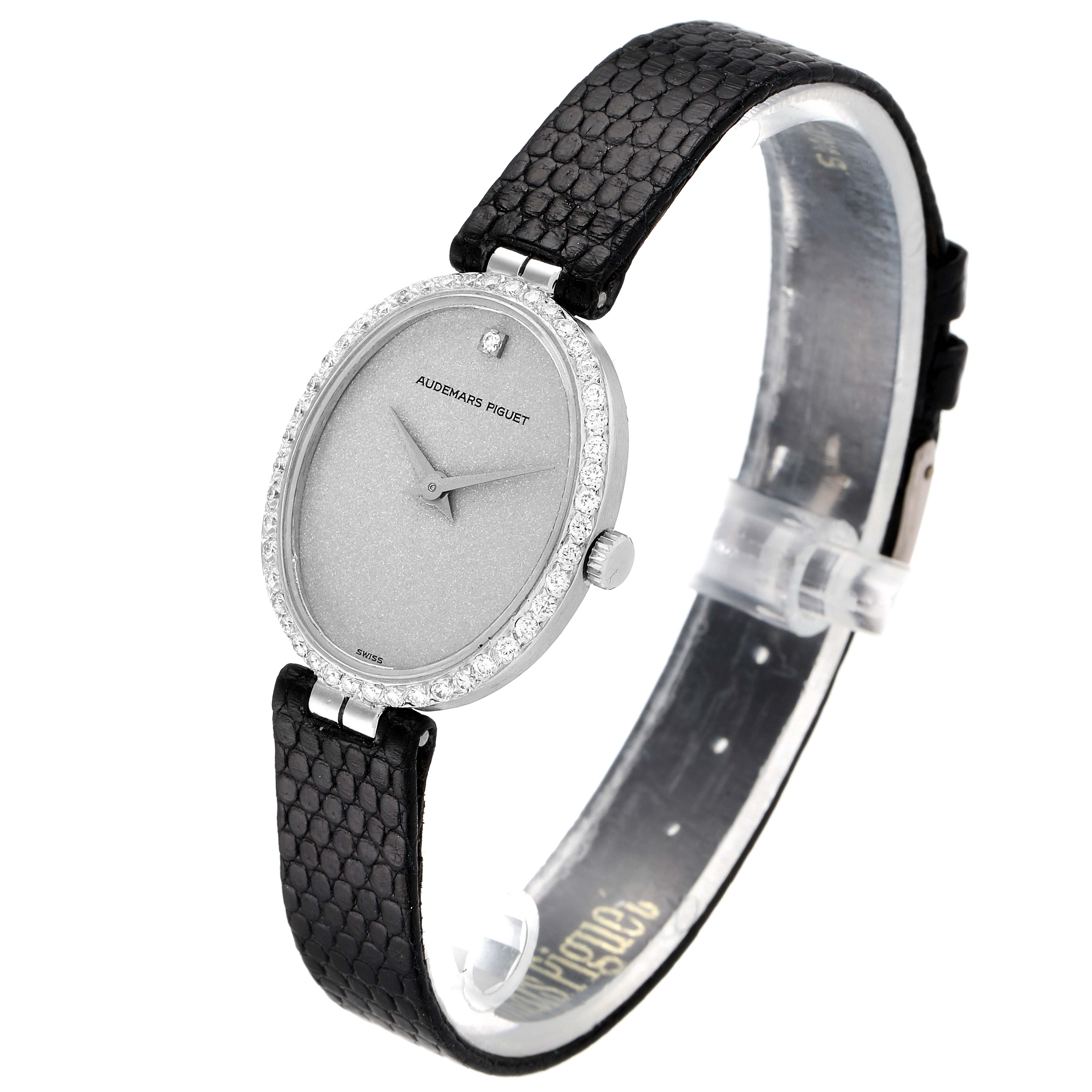 This image shows an angled view of a Vintage Audemars Piguet watch, displaying its face, bezel, and black strap.