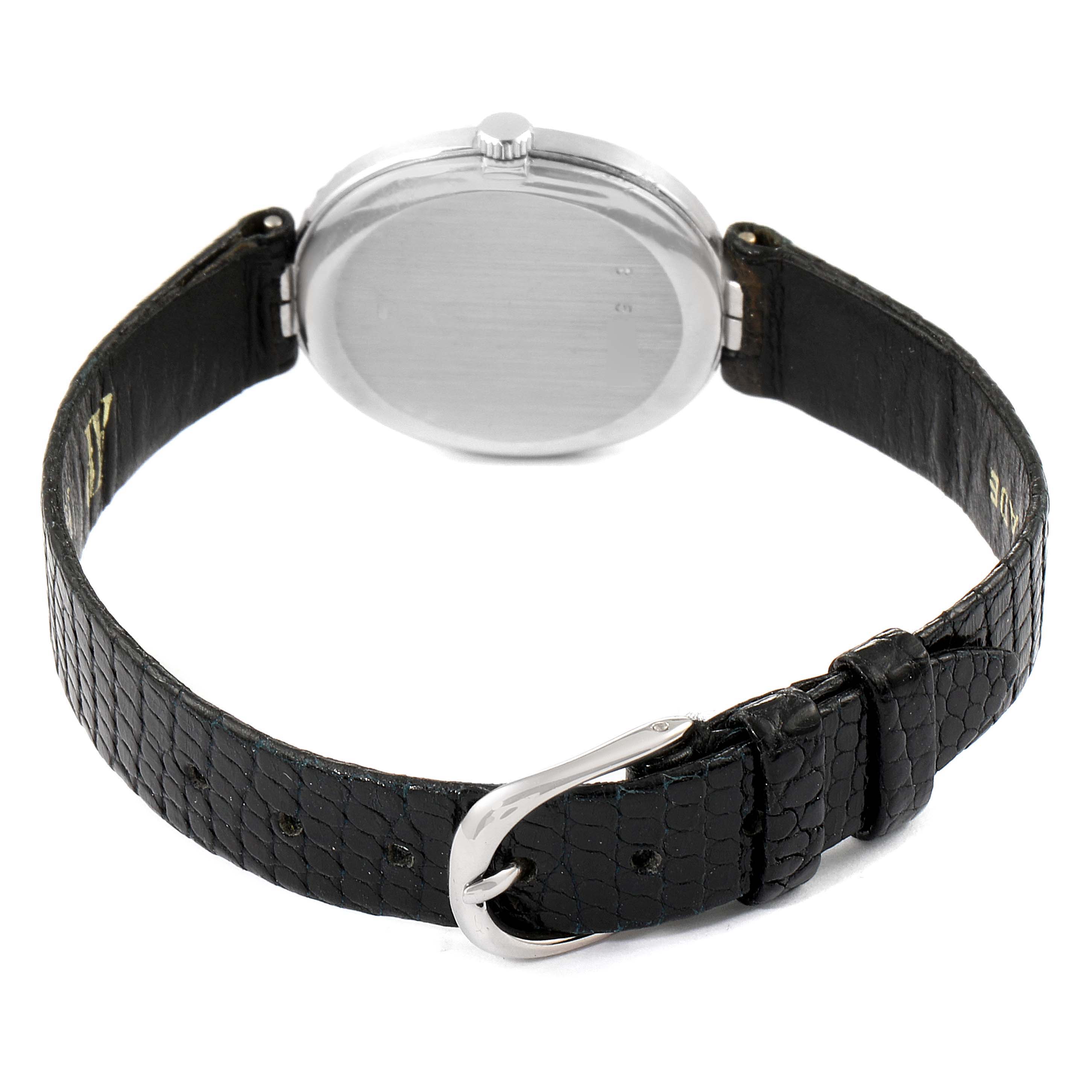 The image shows the back view of a Vintage Audemars Piguet watch with a leather strap and buckle.