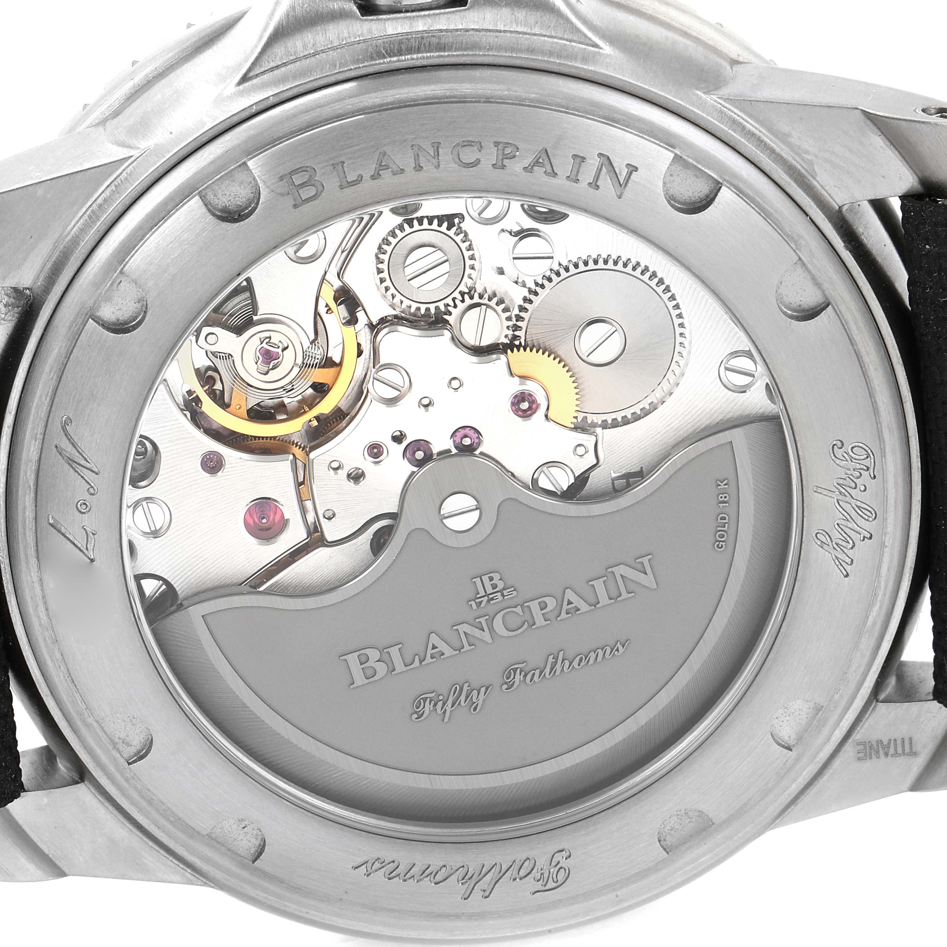 This image shows the back view of a Blancpain Fifty Fathoms 5015-1130-52A Men's Titanium Black Dial 5015-1130-52A Men's Titanium Black Dial watch, highlighting its inner mechanical components and engravings.