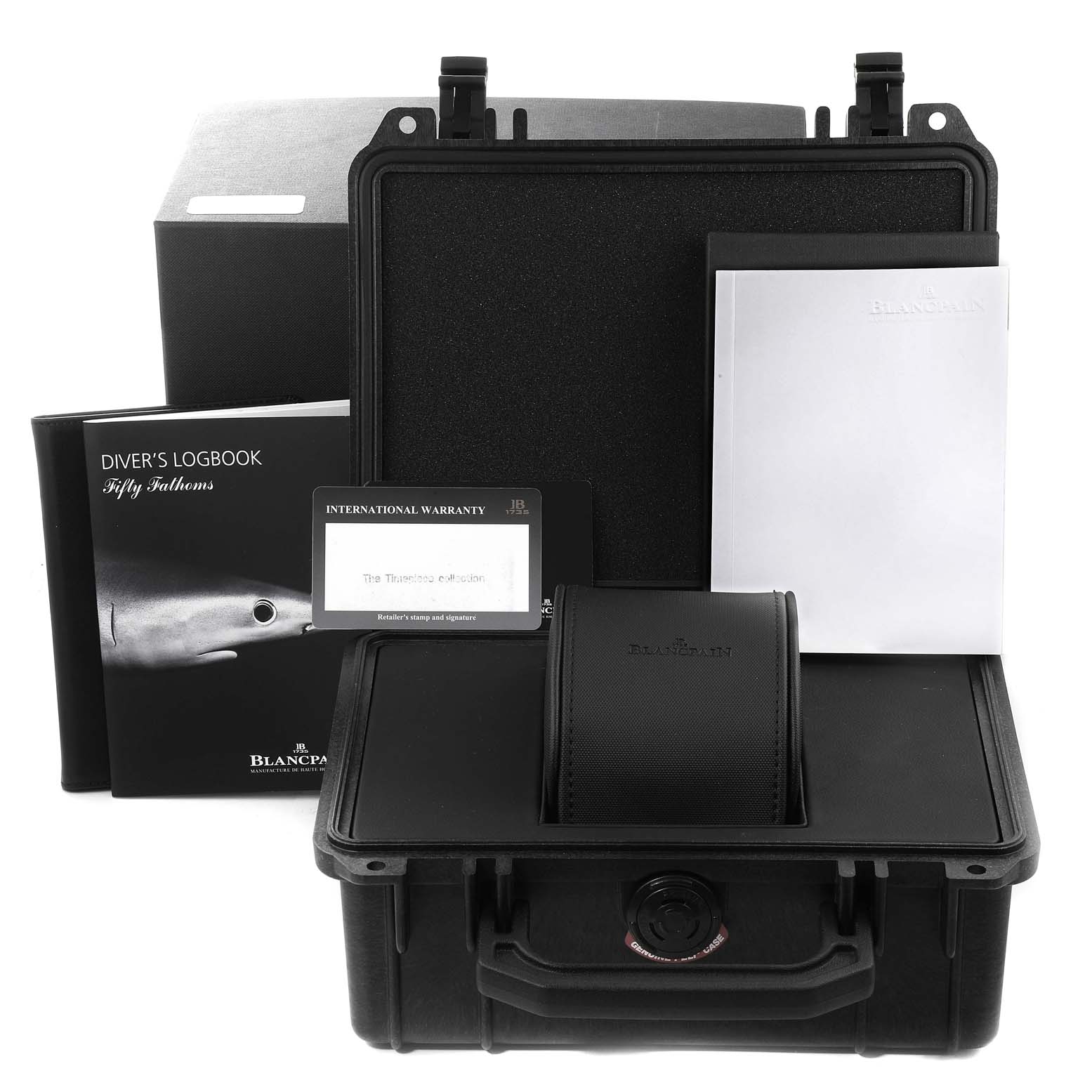 The image shows the packaging and accessories for the Blancpain Fifty Fathoms 5015-1130-52A Men's Titanium Black Dial 5015-1130-52A Men's Titanium Black Dial watch, including the diver's logbook, warranty card, and storage case.