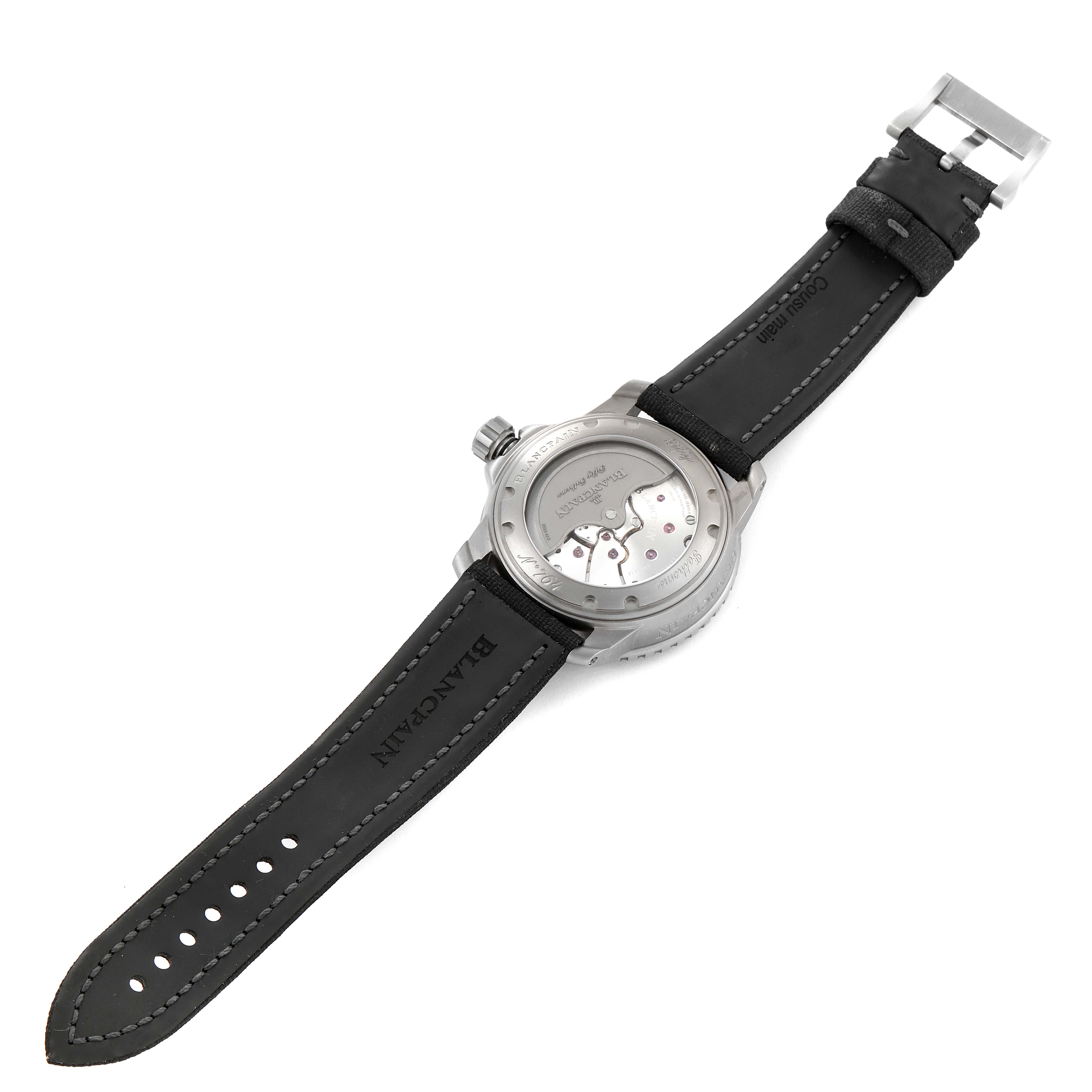 This image shows the back of a Blancpain Fifty Fathoms 5015-1130-52A Men's Titanium Black Dial 5015-1130-52A Men's Titanium Black Dial watch, displaying the movement and the leather strap.