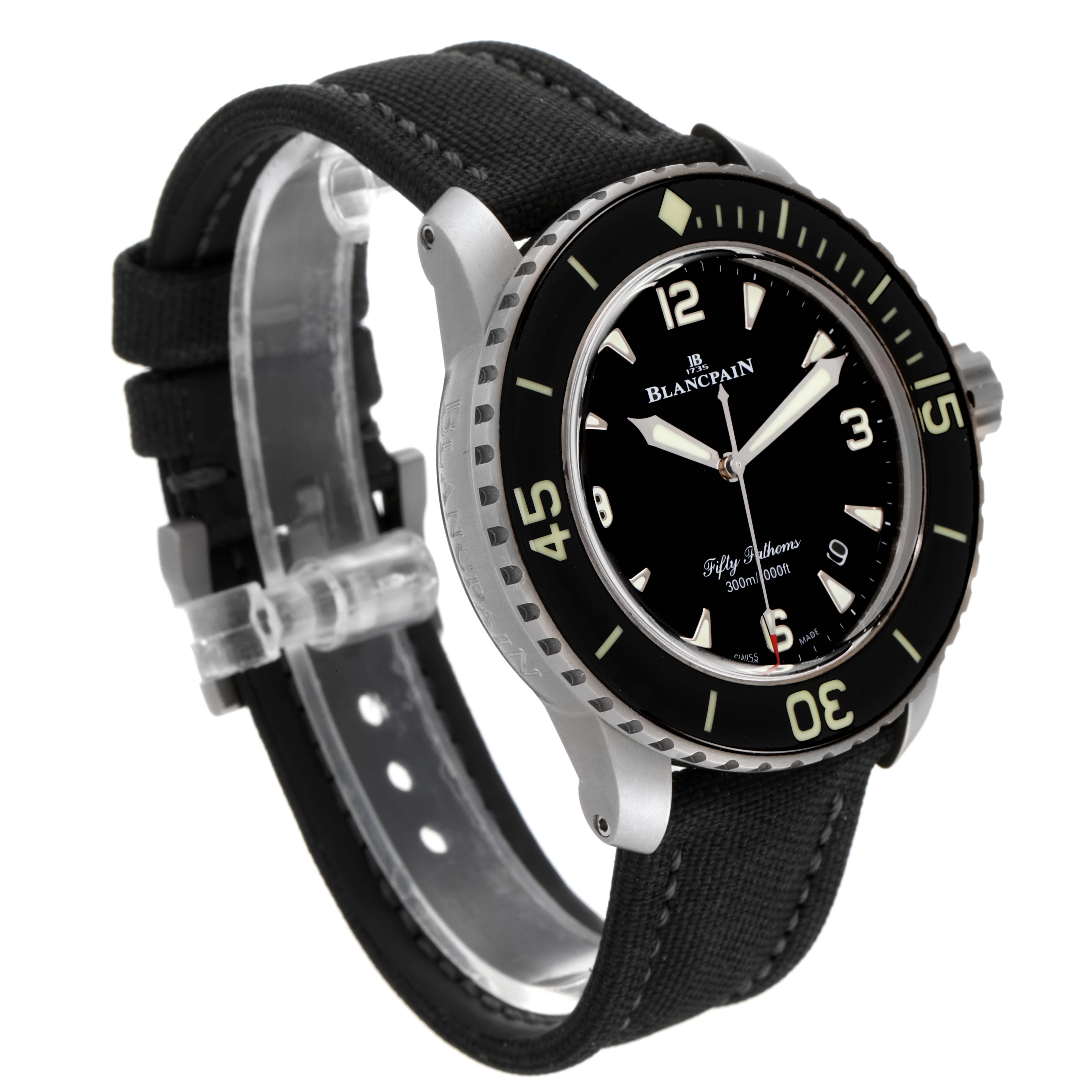 The image shows a Blancpain Fifty Fathoms 5015-1130-52A Men's Titanium Black Dial 5015-1130-52A Men's Titanium Black Dial watch from an angle highlighting the face, bezel, and strap.